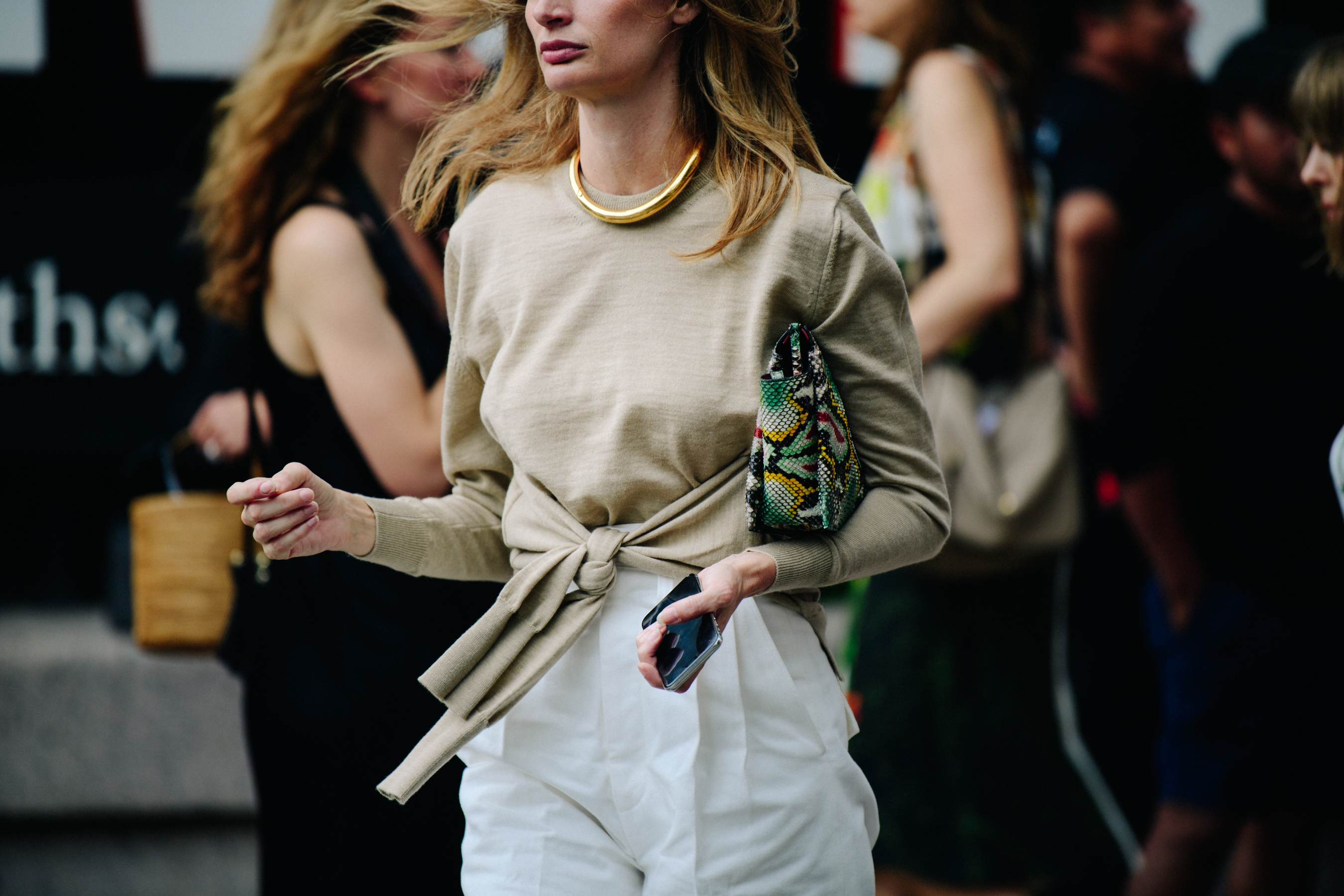 Woman wearing beige top