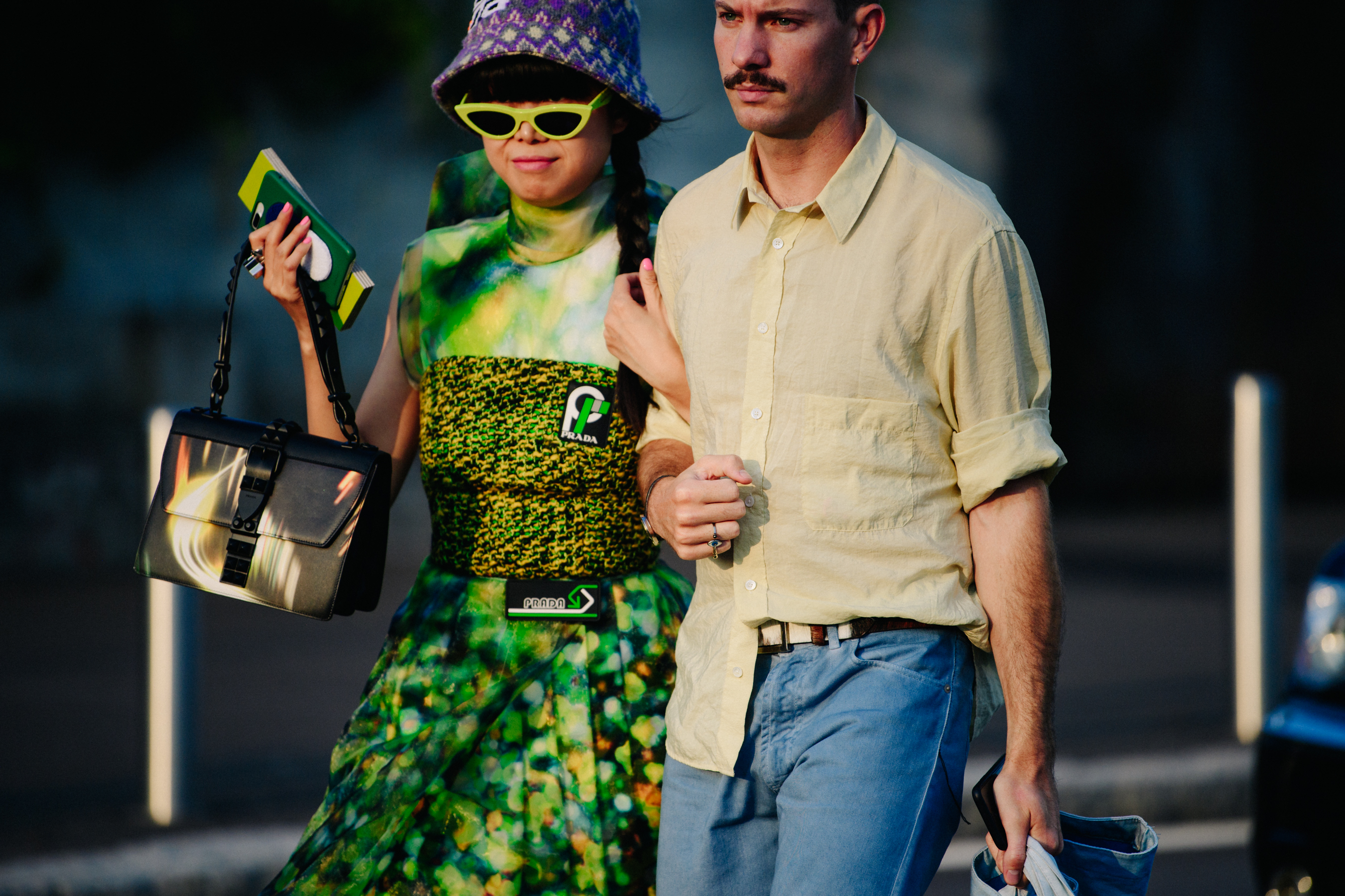 Couple wearing Prada outfits