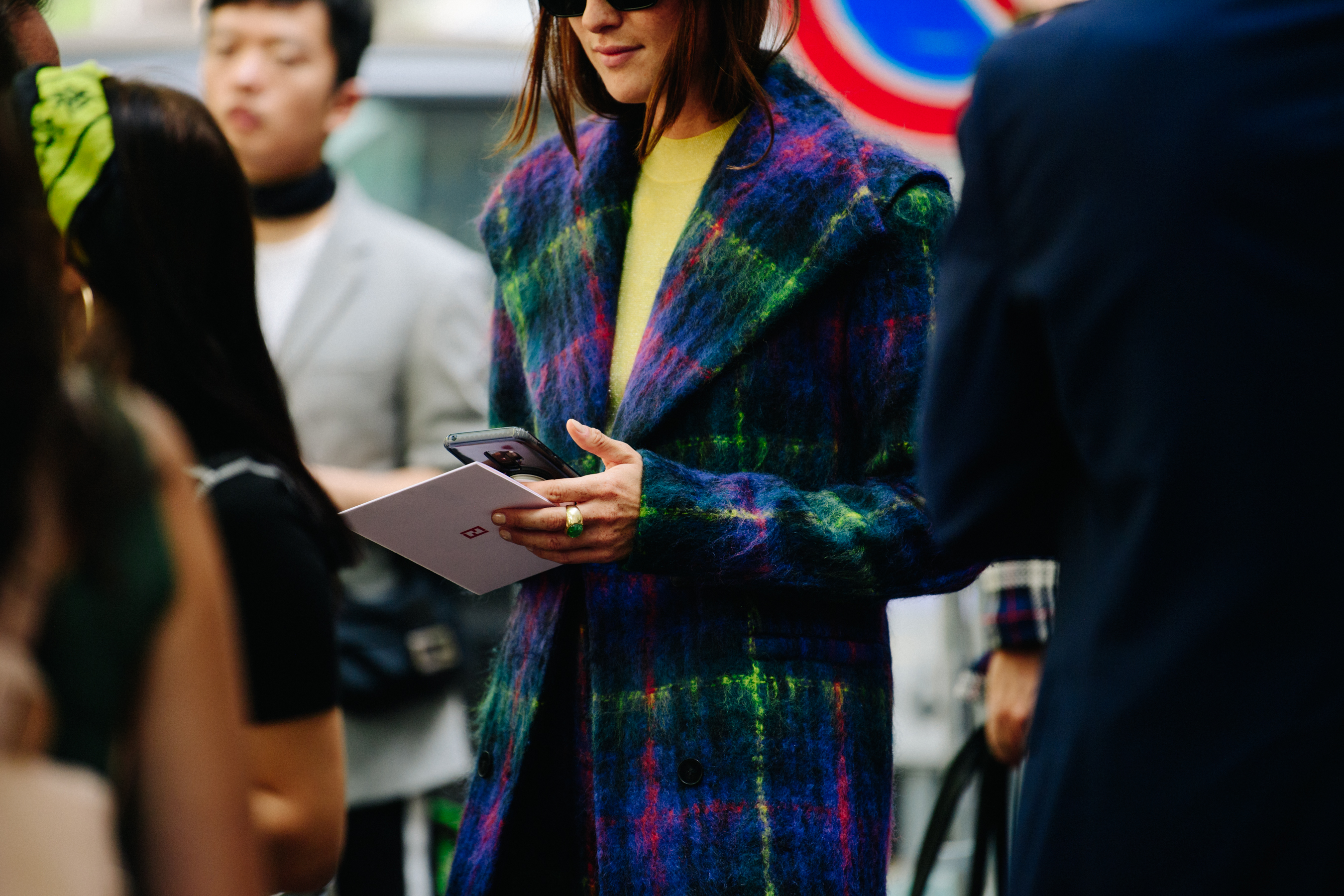 Woman wearing colourful wool coat