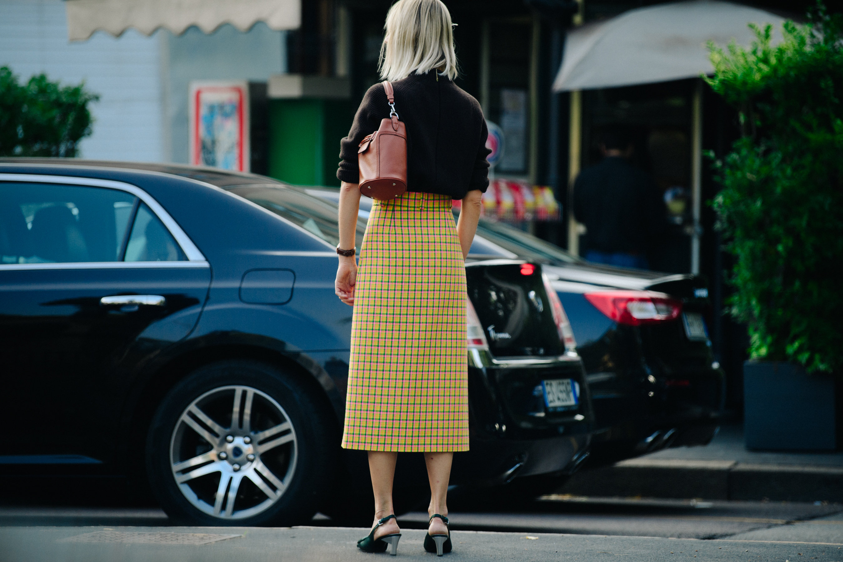 Woman wearing long yellow skirt