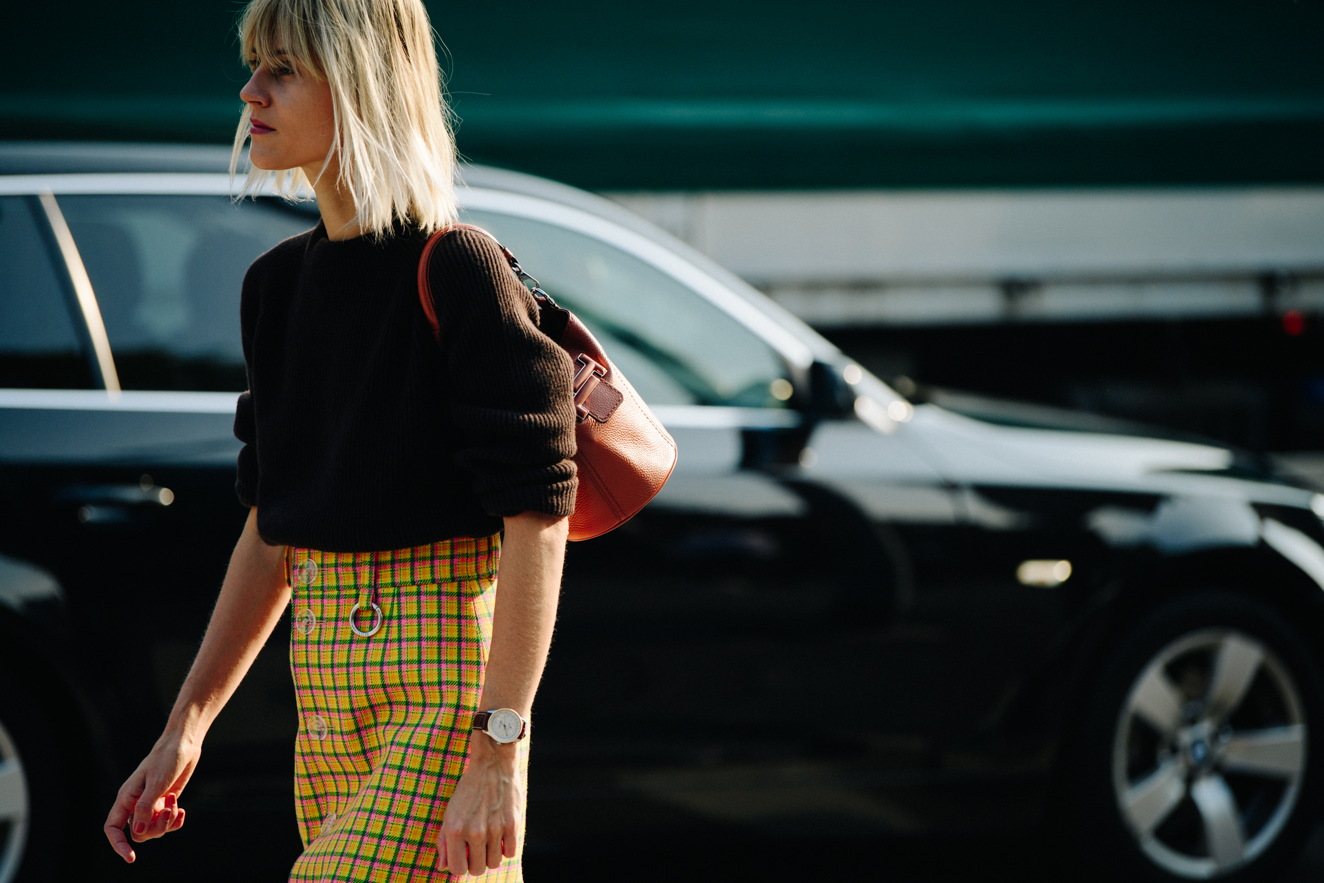 Woman wearing long yellow skirt