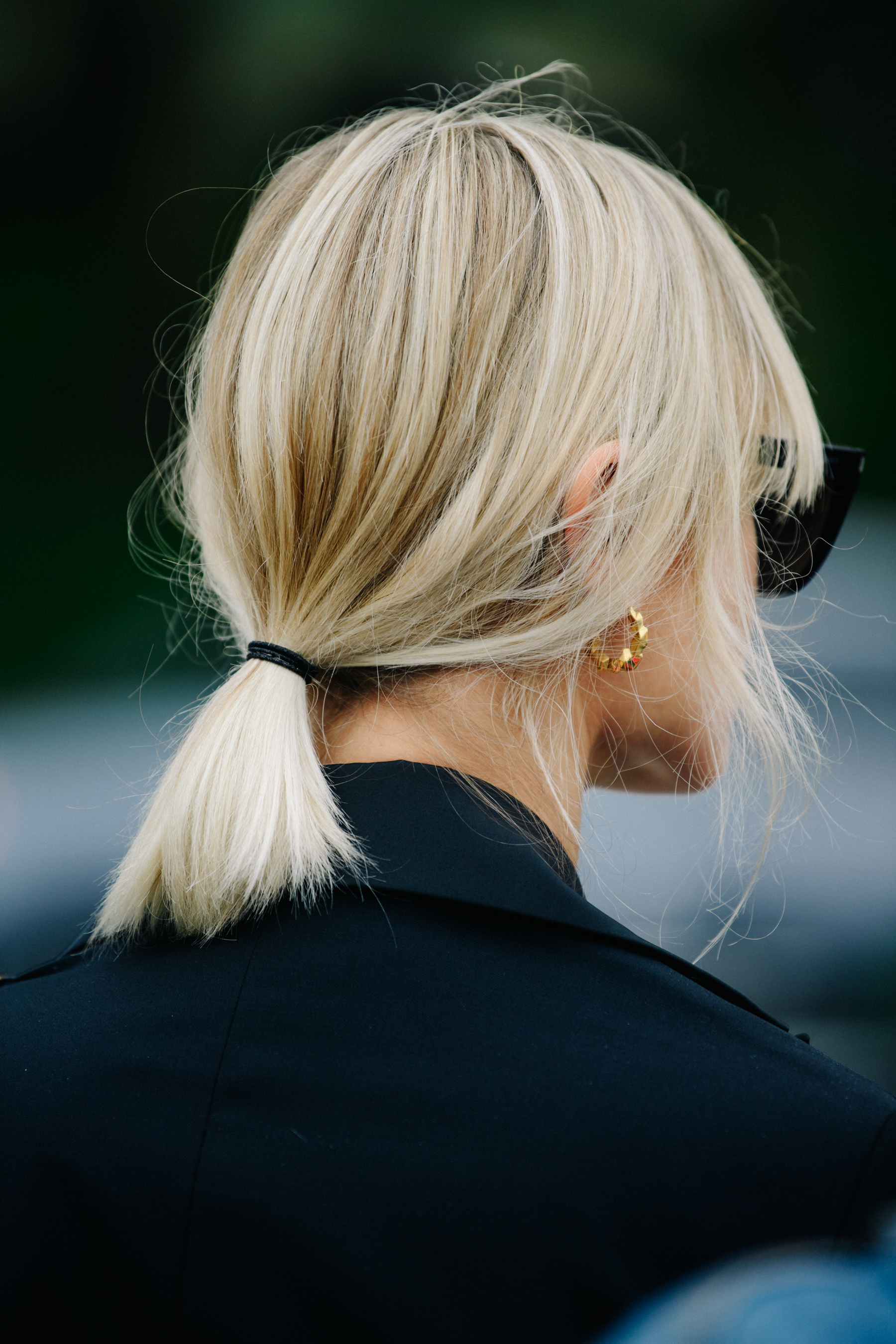 Woman with blonde hair in ponytail