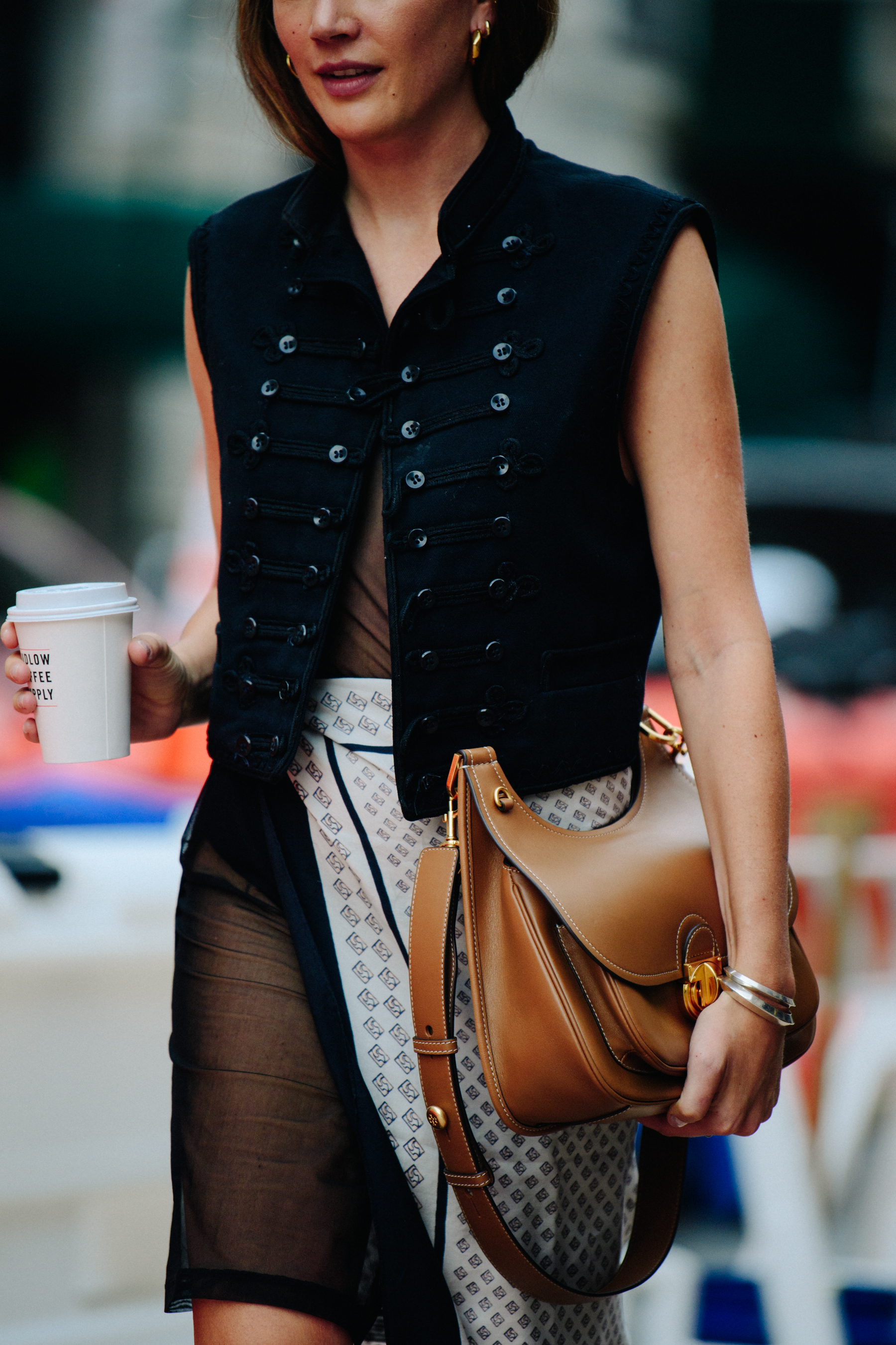 Woman wearing black vest