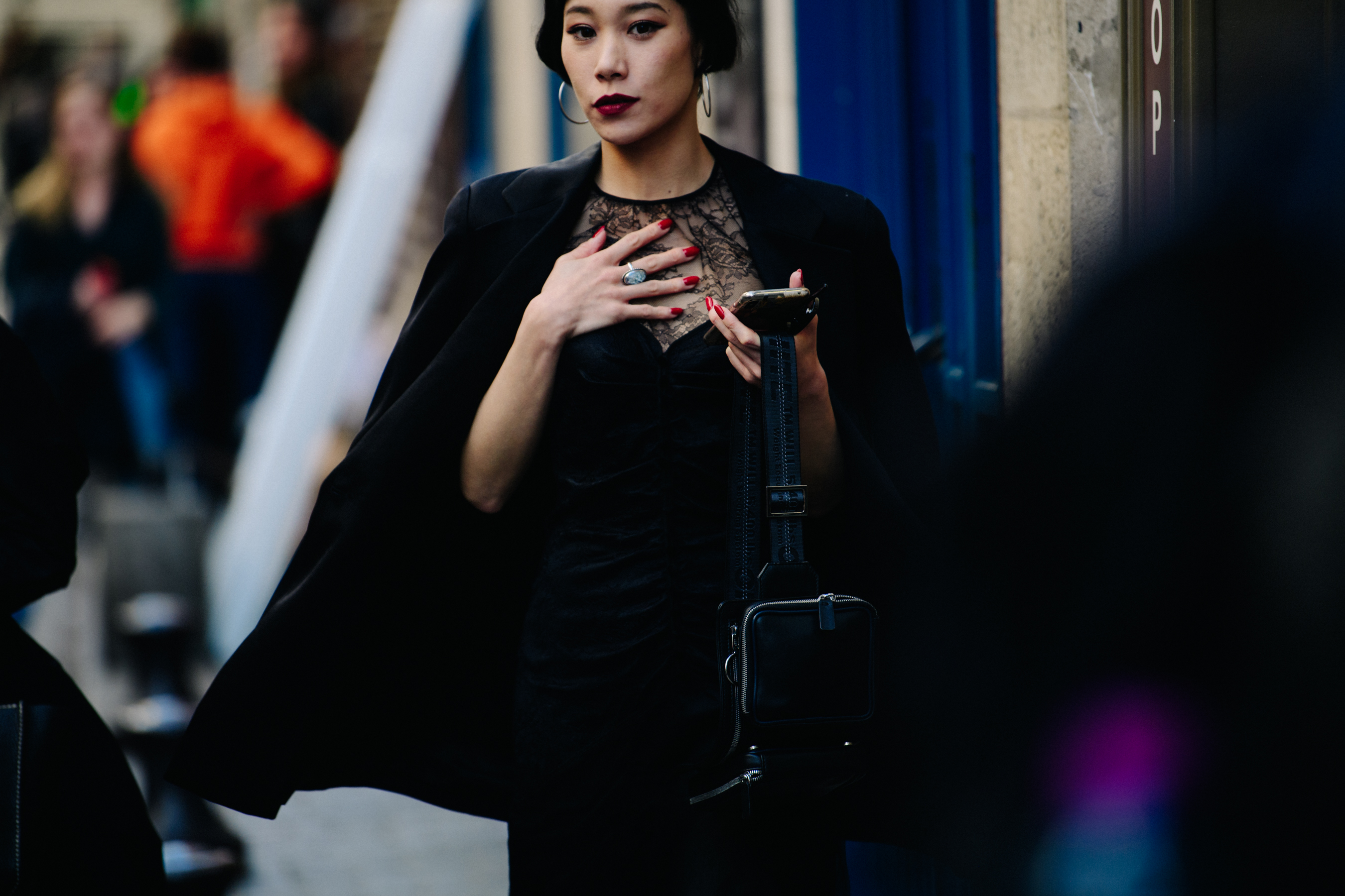 Woman wearing black lace dress