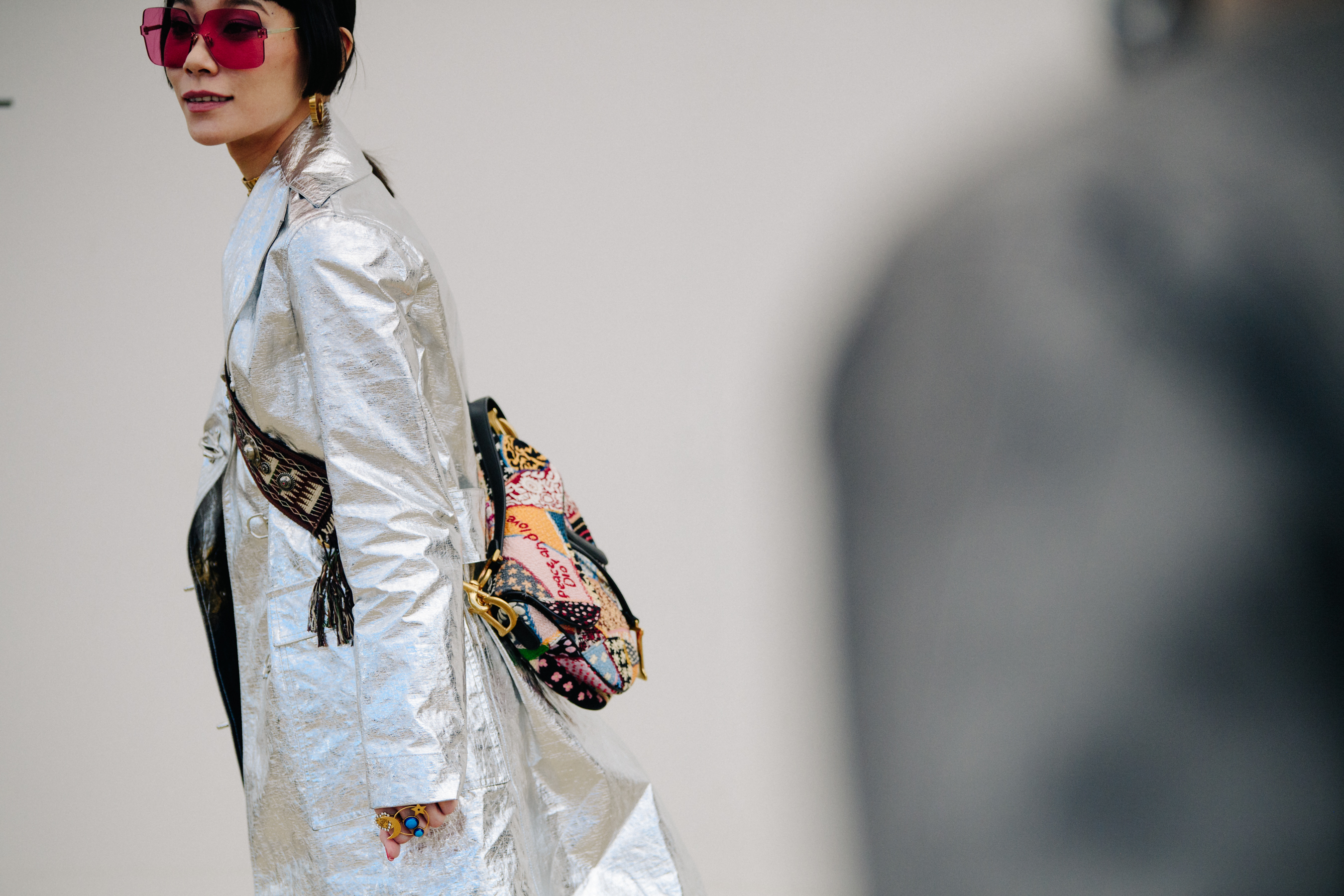 Woman carrying Christian Dior bag