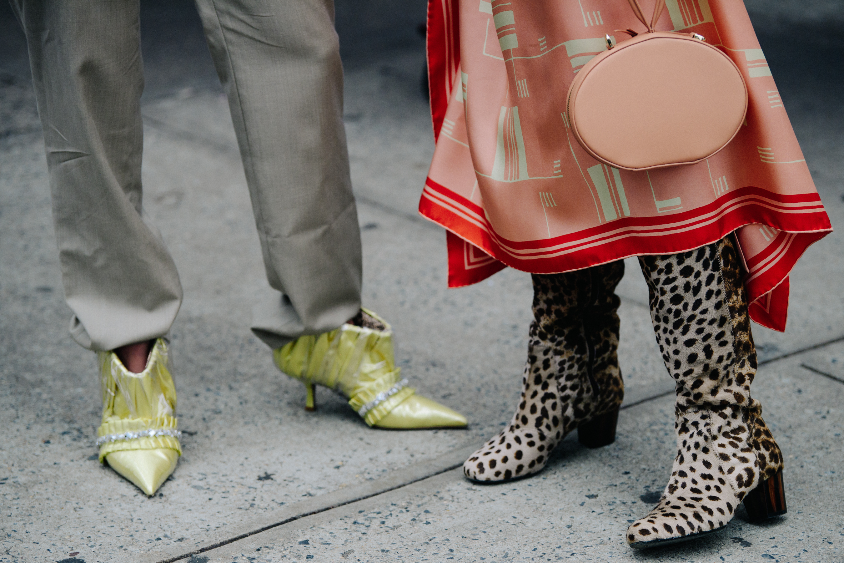 Two women wearing heeled shoes
