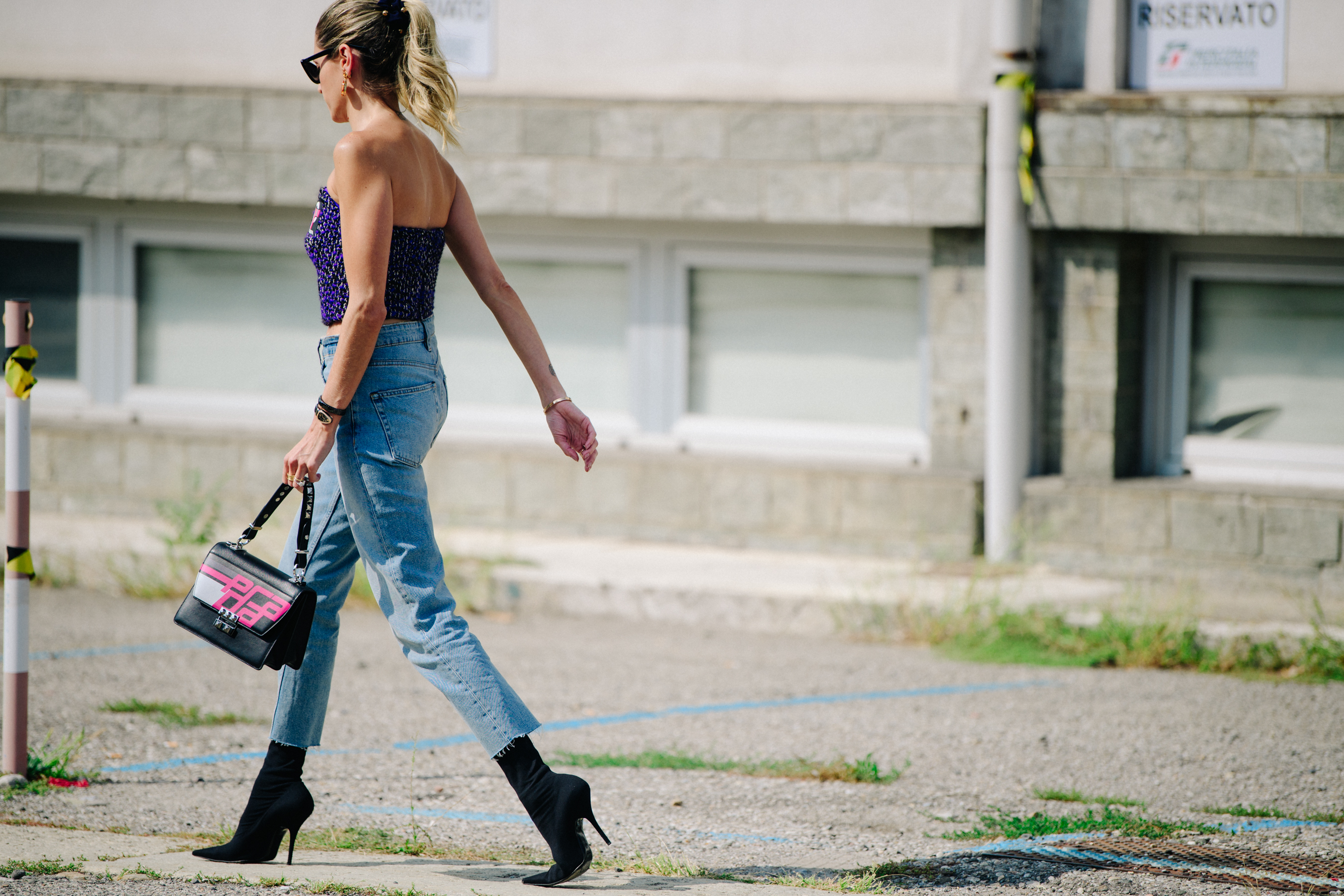 Woman carrying Prada bag