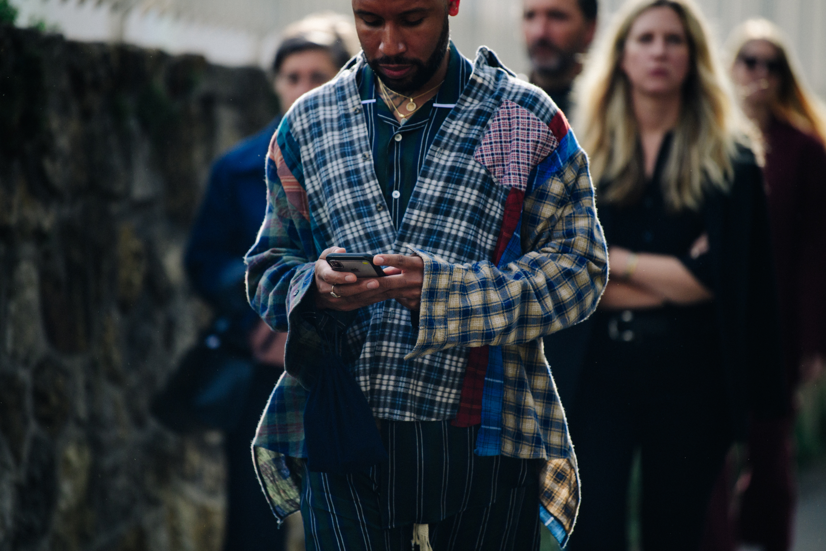 Man wearing patch work shirt