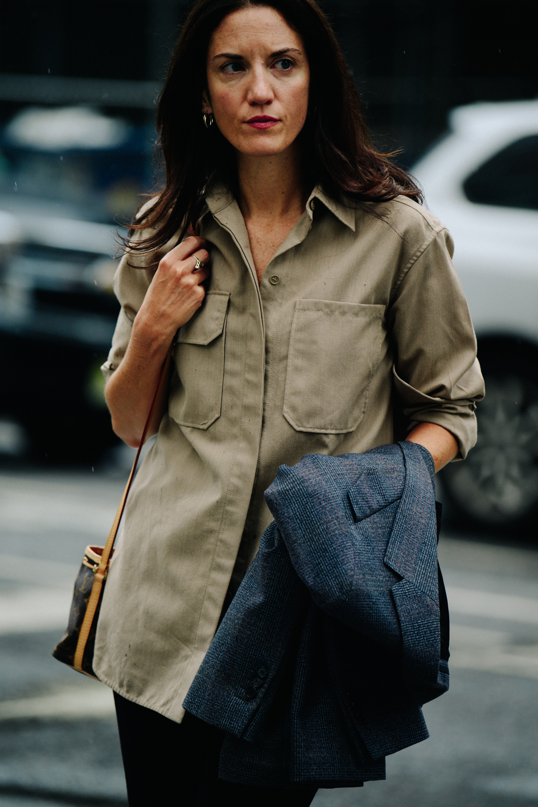 Woman wearing tan shirt