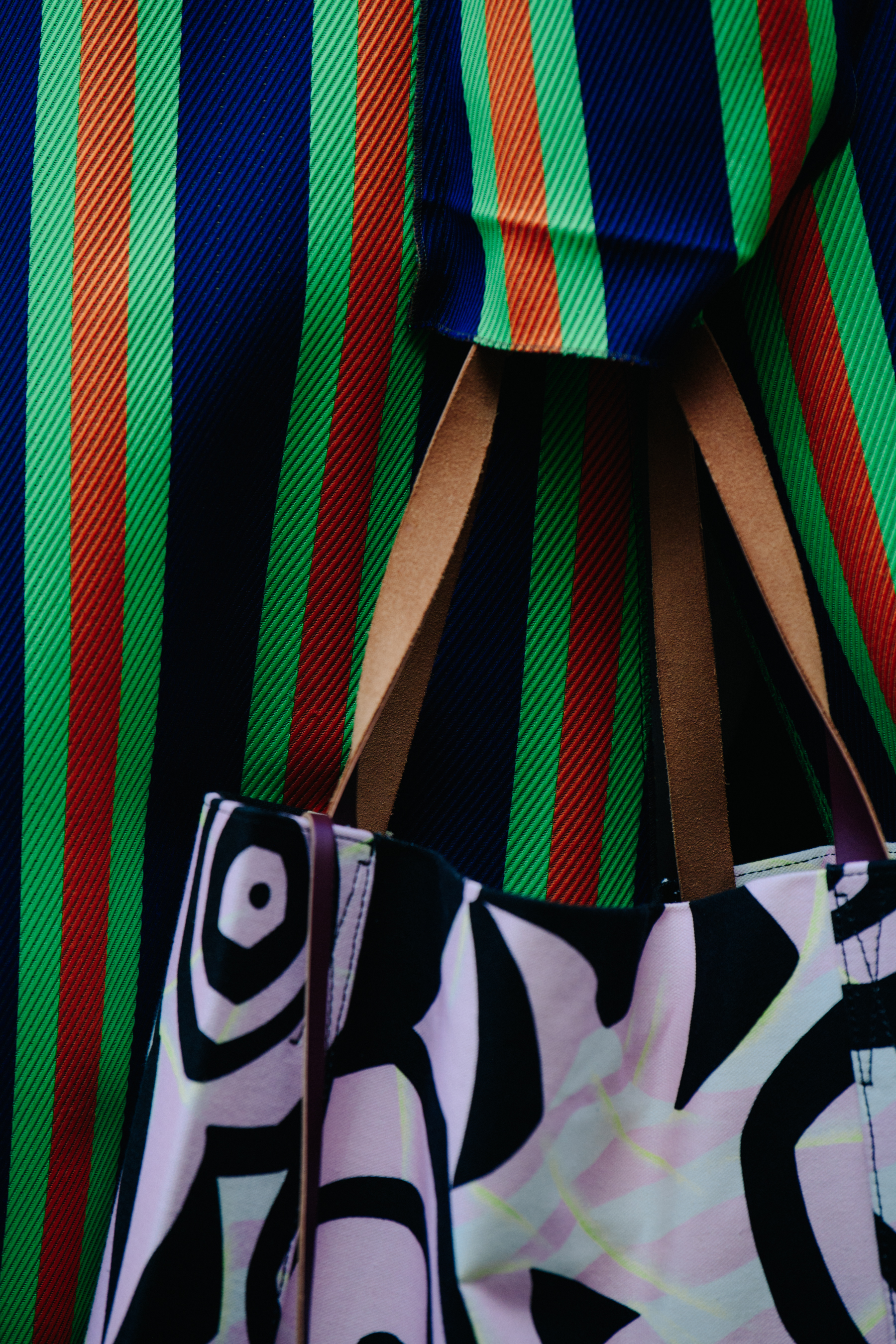 Woman wearing striped coat