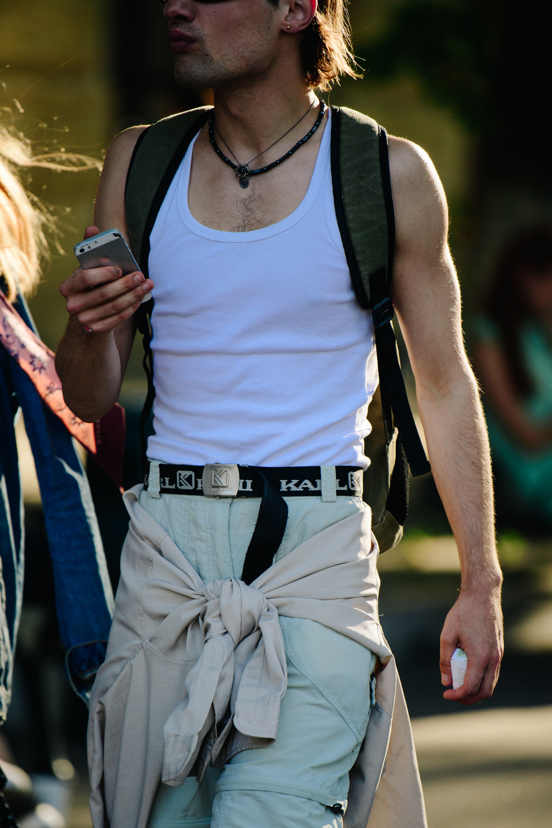 Man wearing light green pants