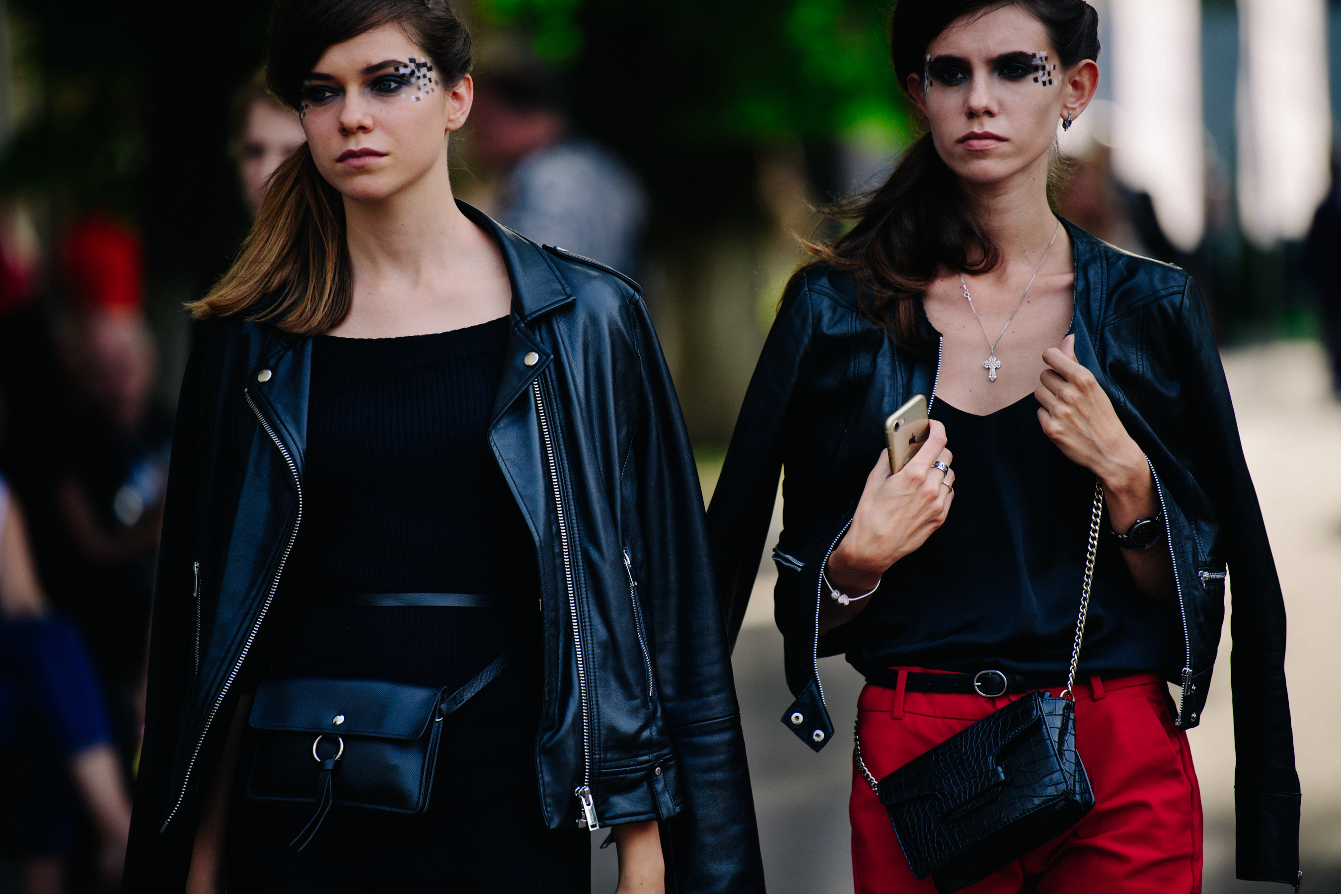 Two models wearing leather jackets