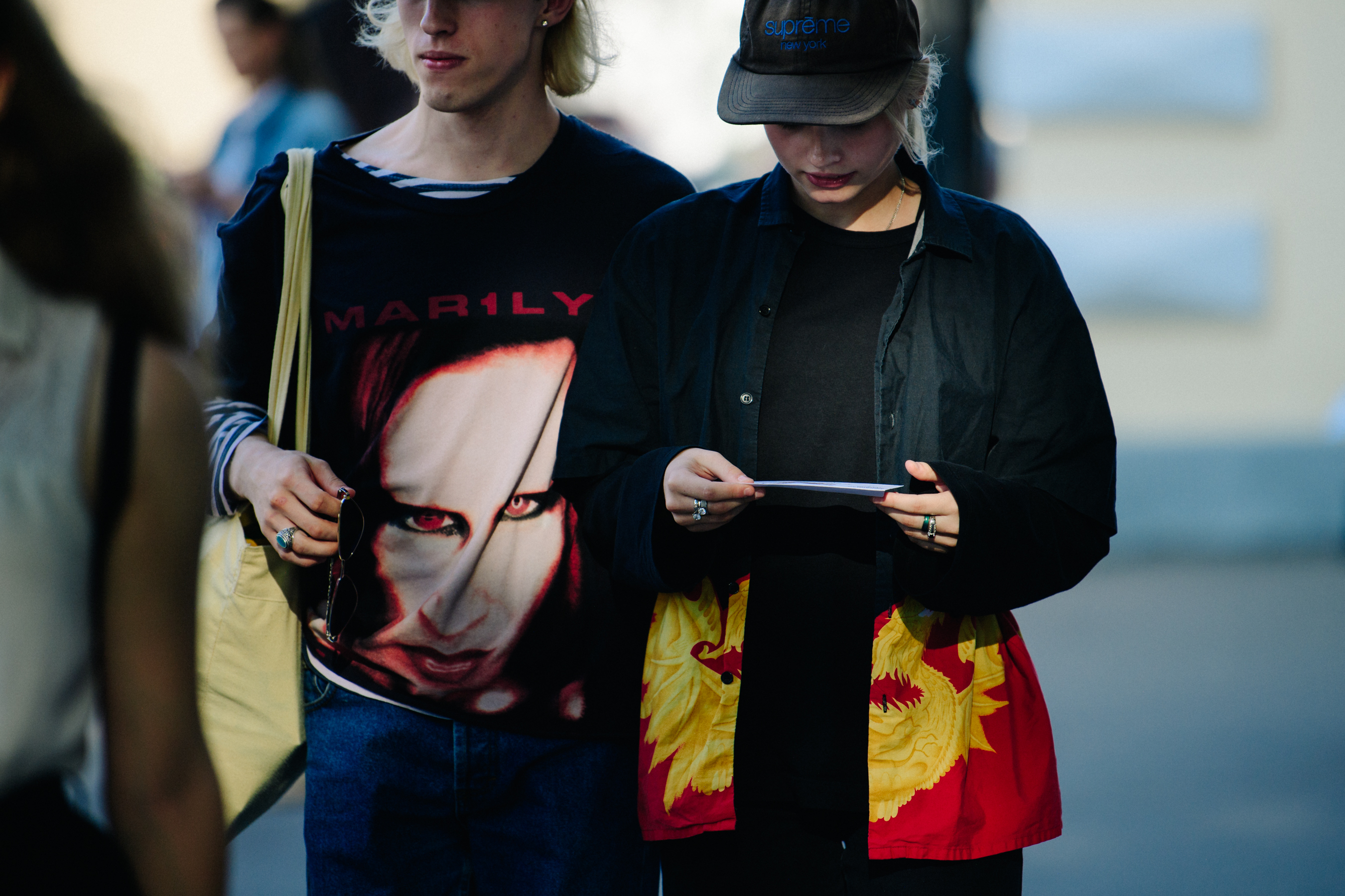 Couple wearing dark outfits