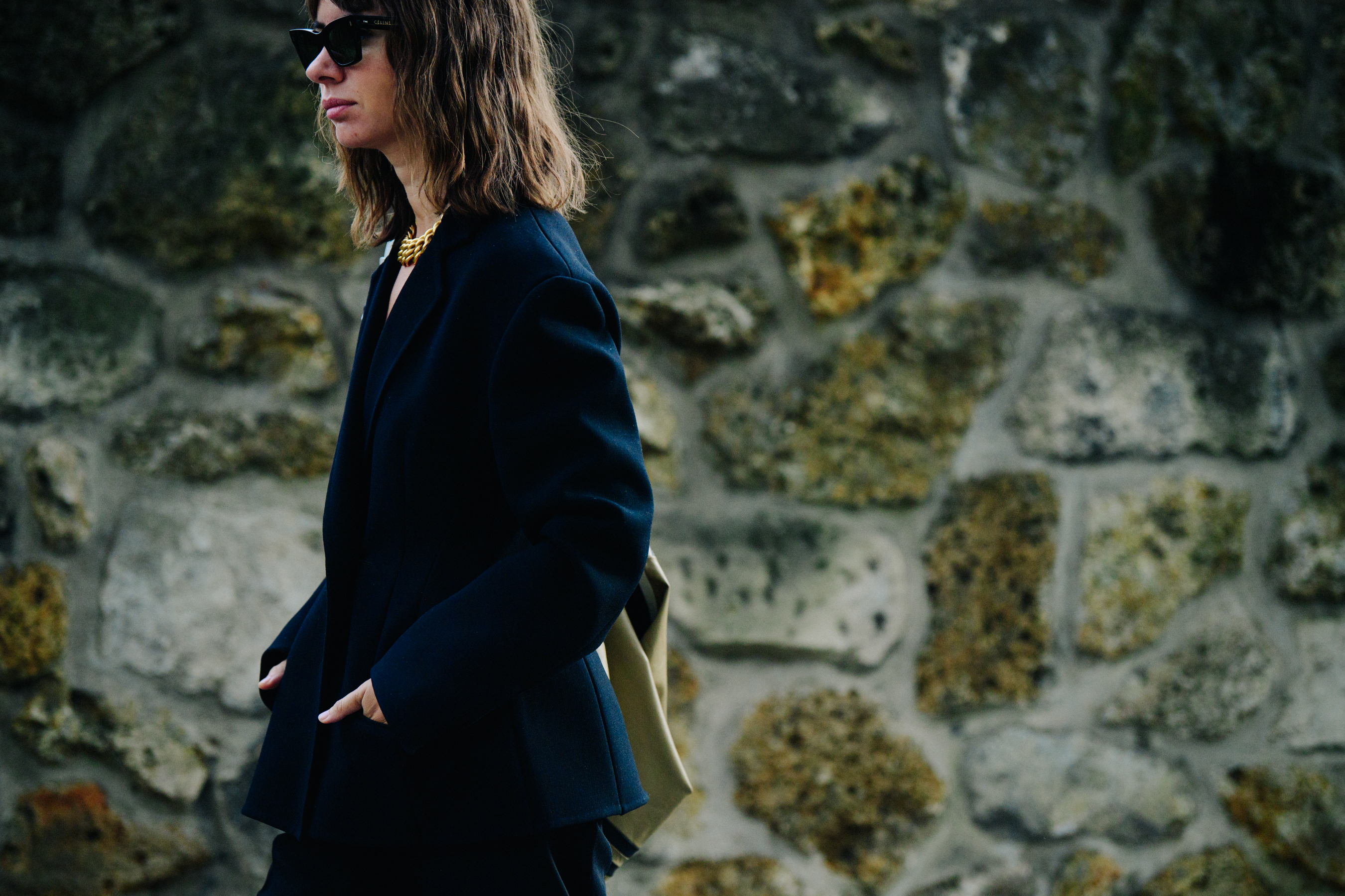 Russian buyer wearing dark wool coat