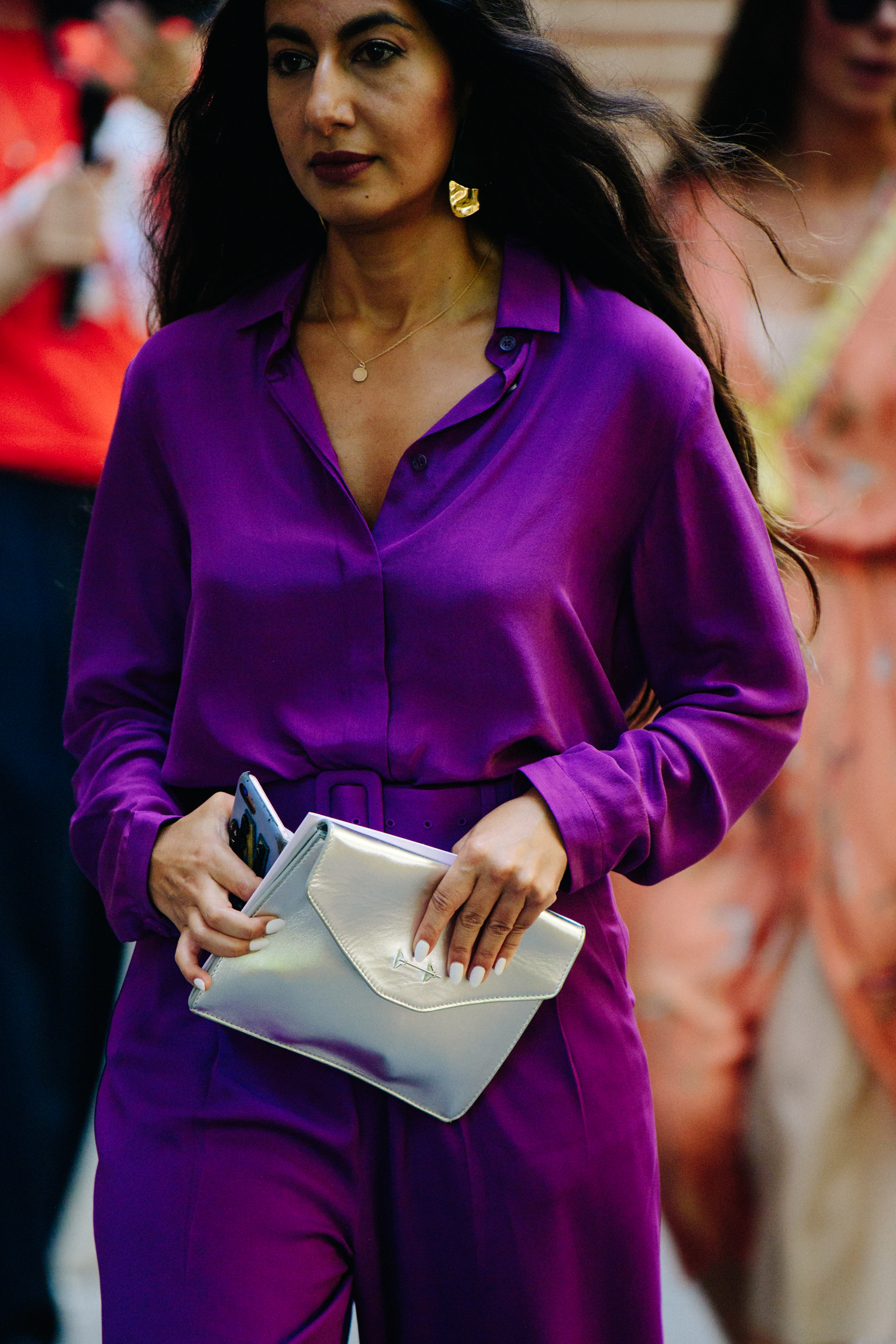 Woman wearing purple outfit
