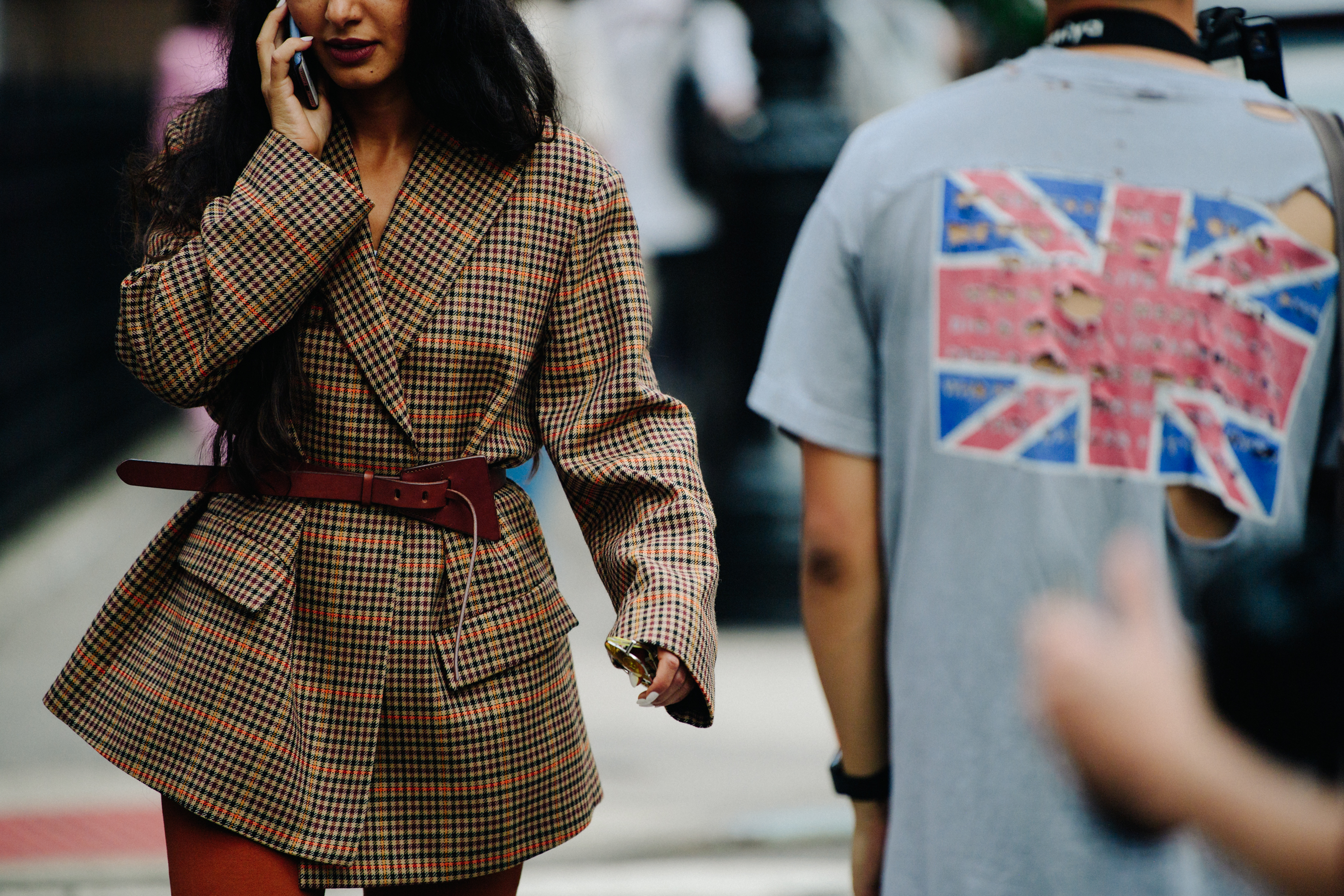 Woman wearing brown check jacket