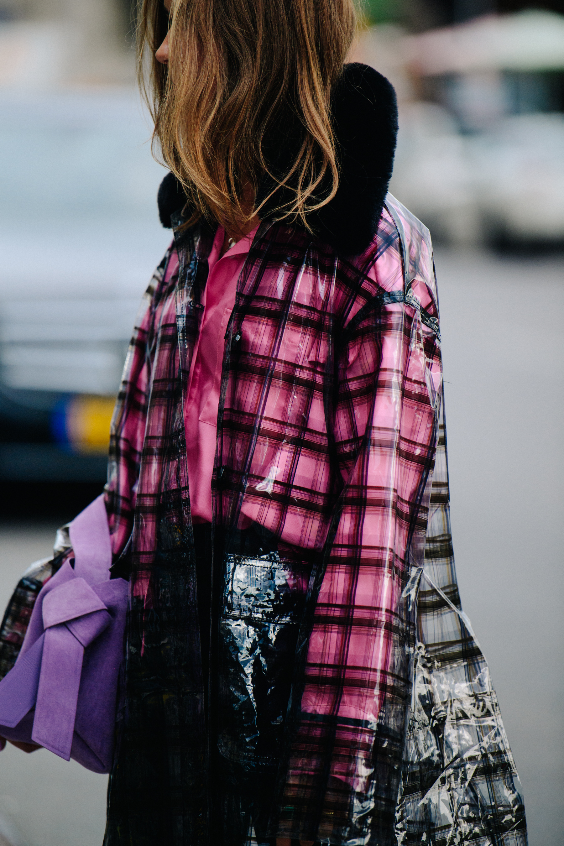 Woman wearing plastic coat