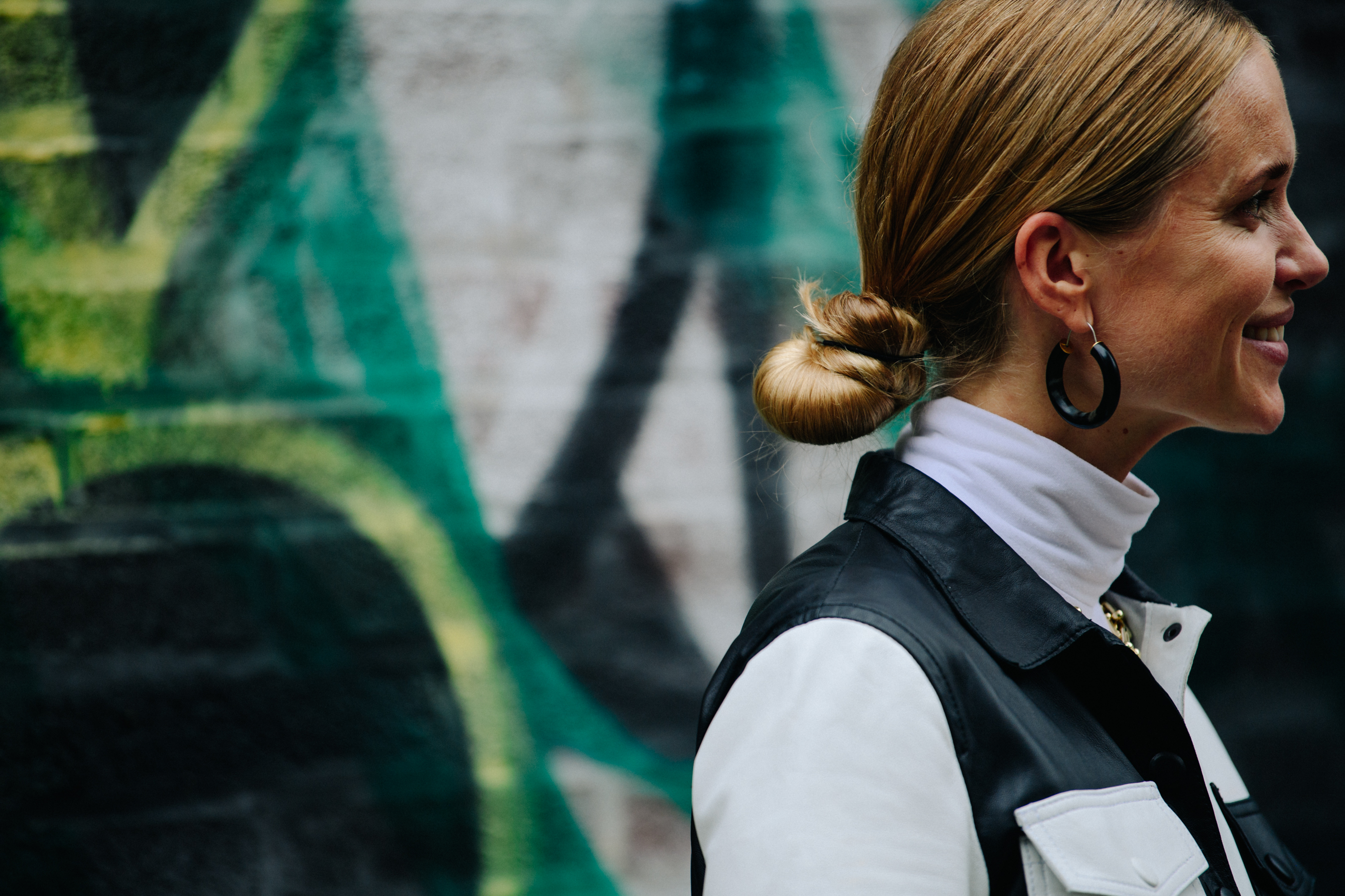 Danish woman wearing black earring