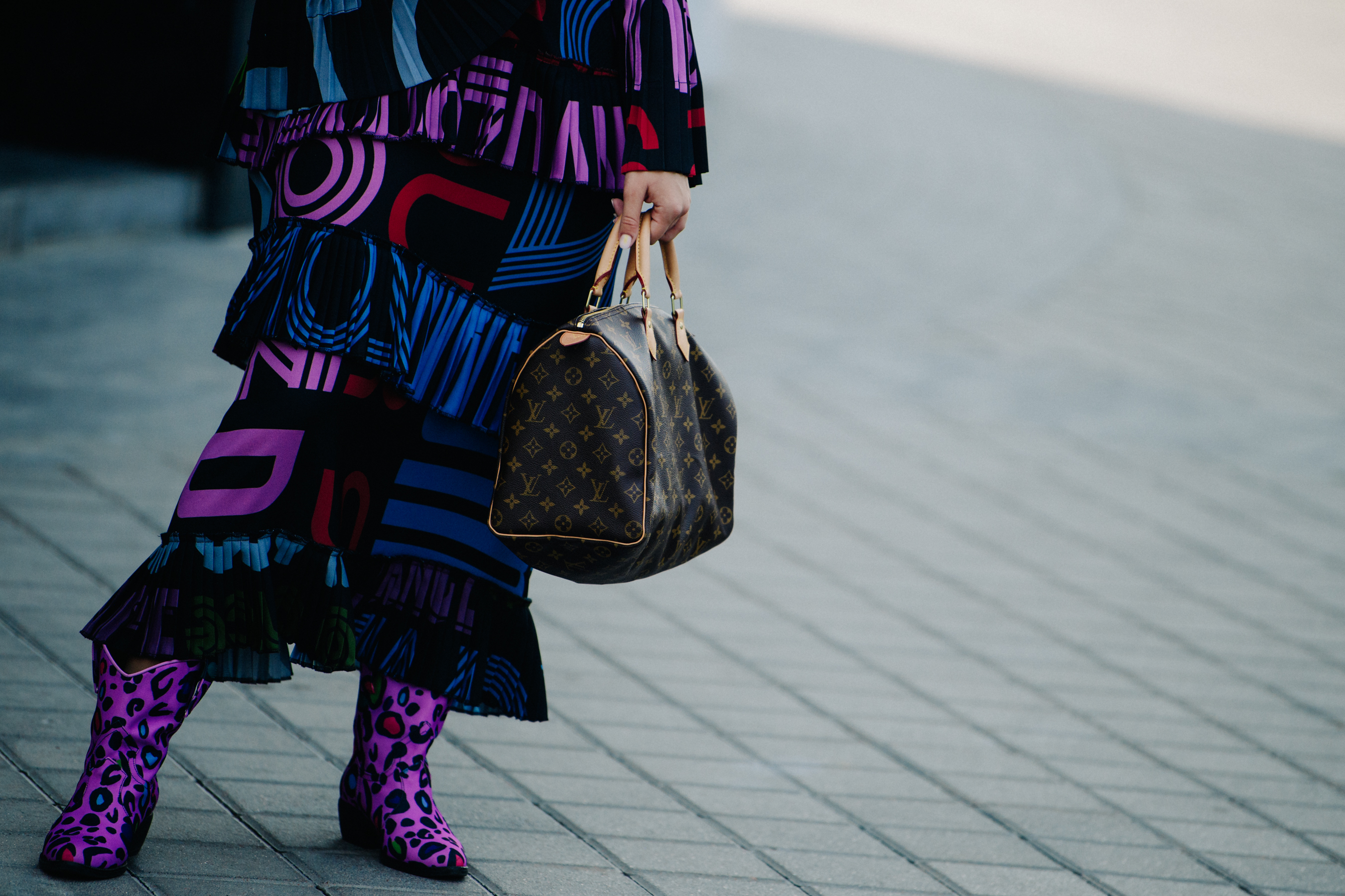 Woman wearing purple boots