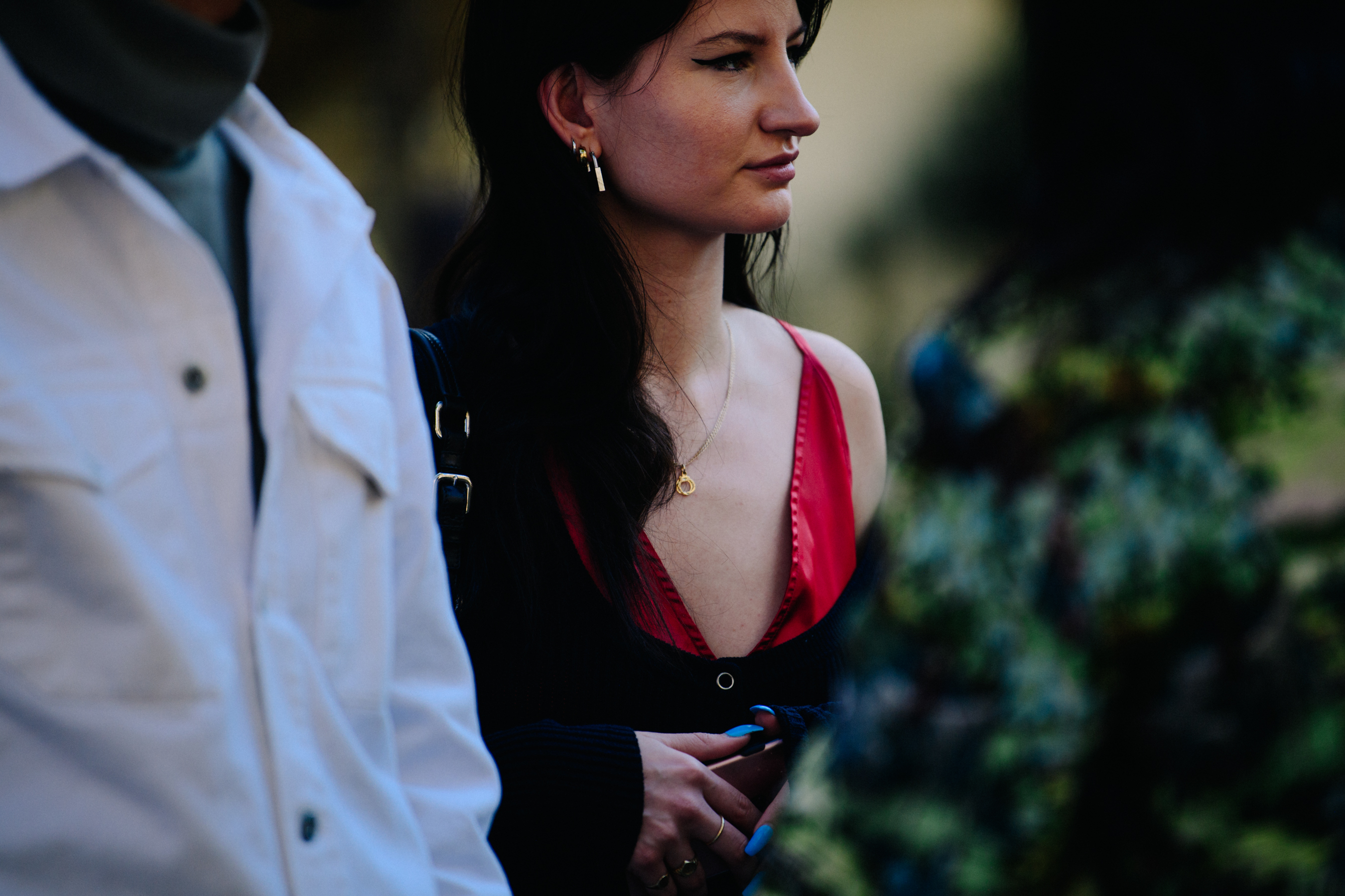 Woman wearing red strap top