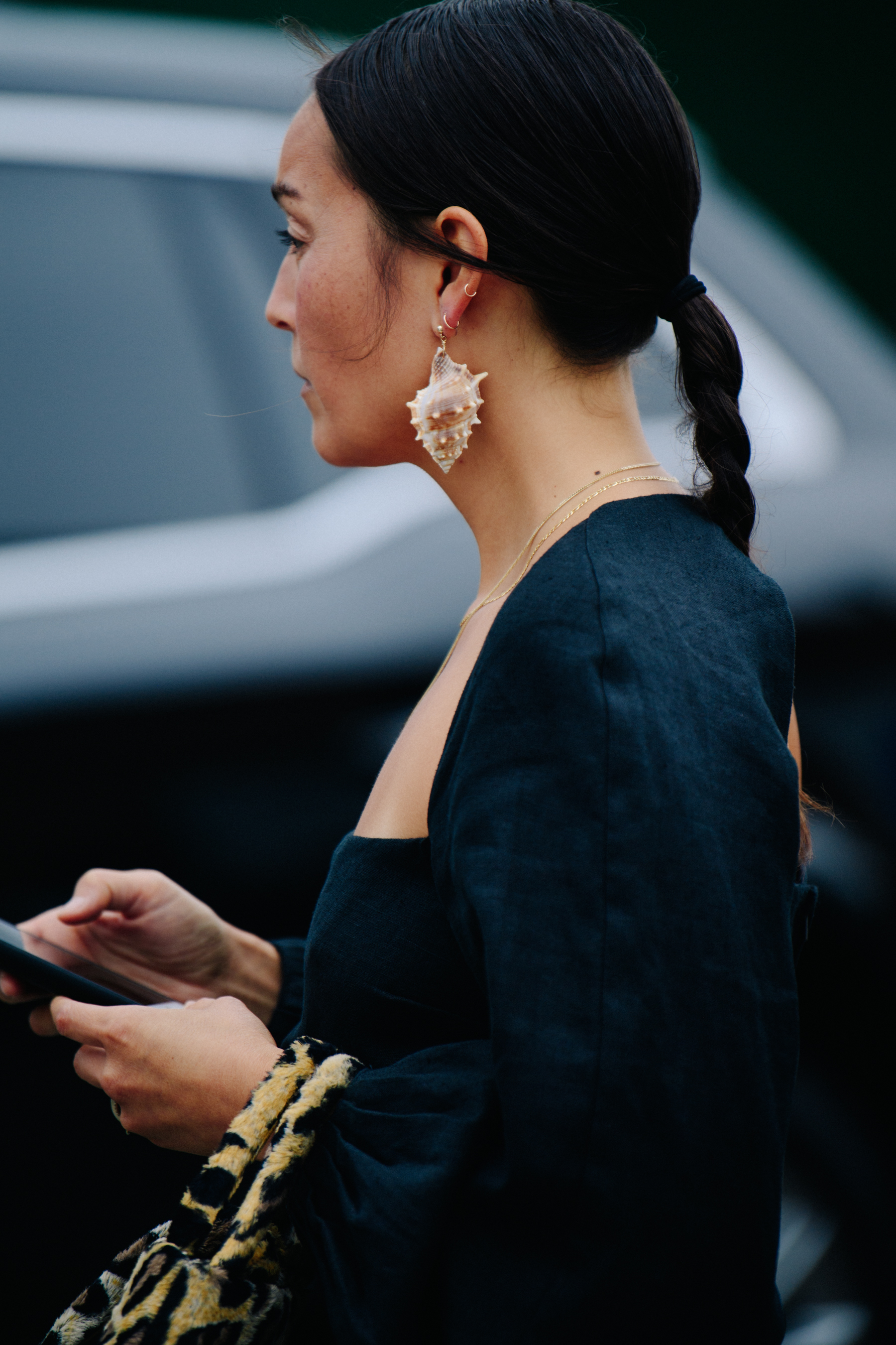 Woman wearing sea shell earring