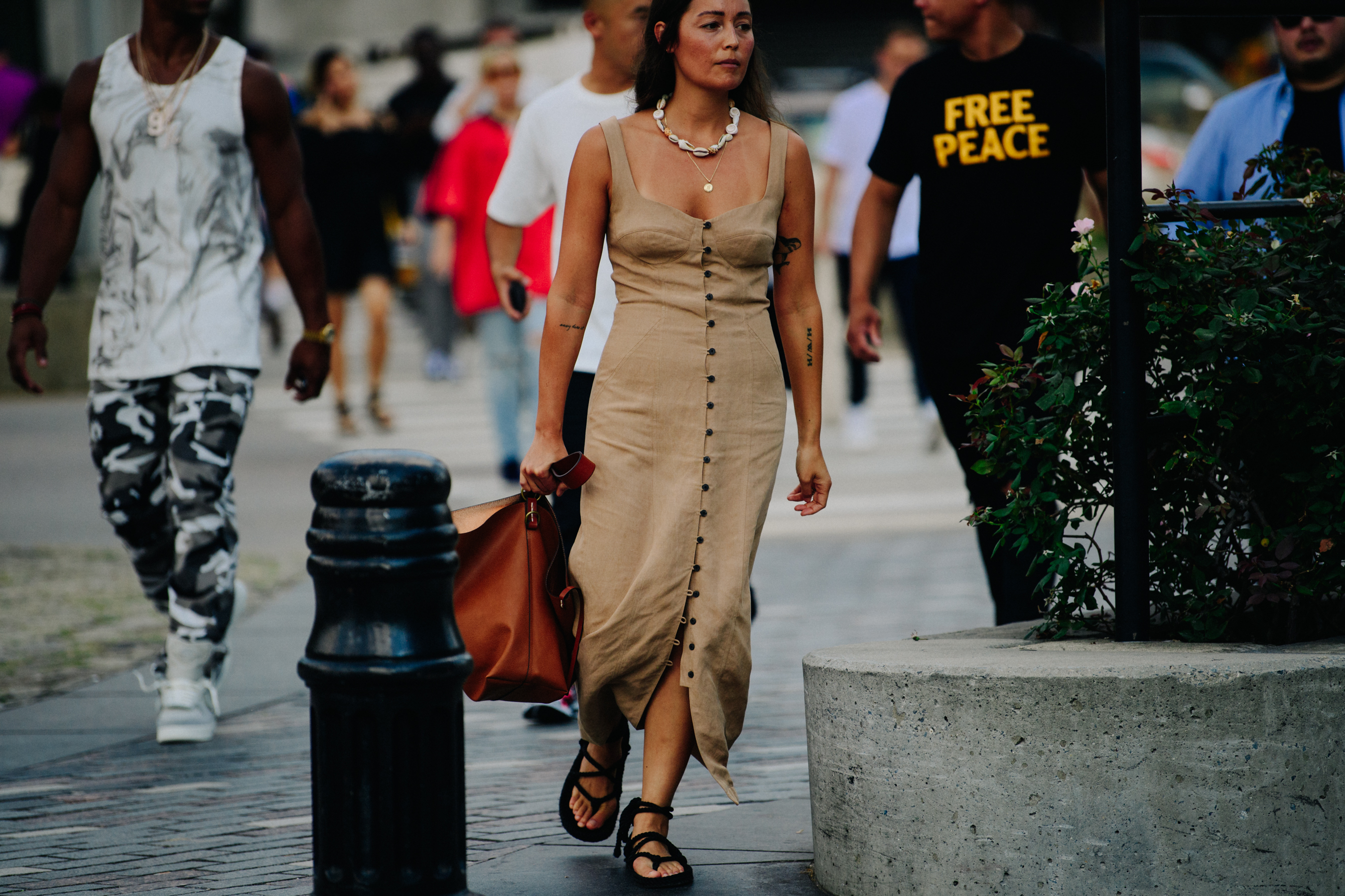 Woman wearing long brown dress