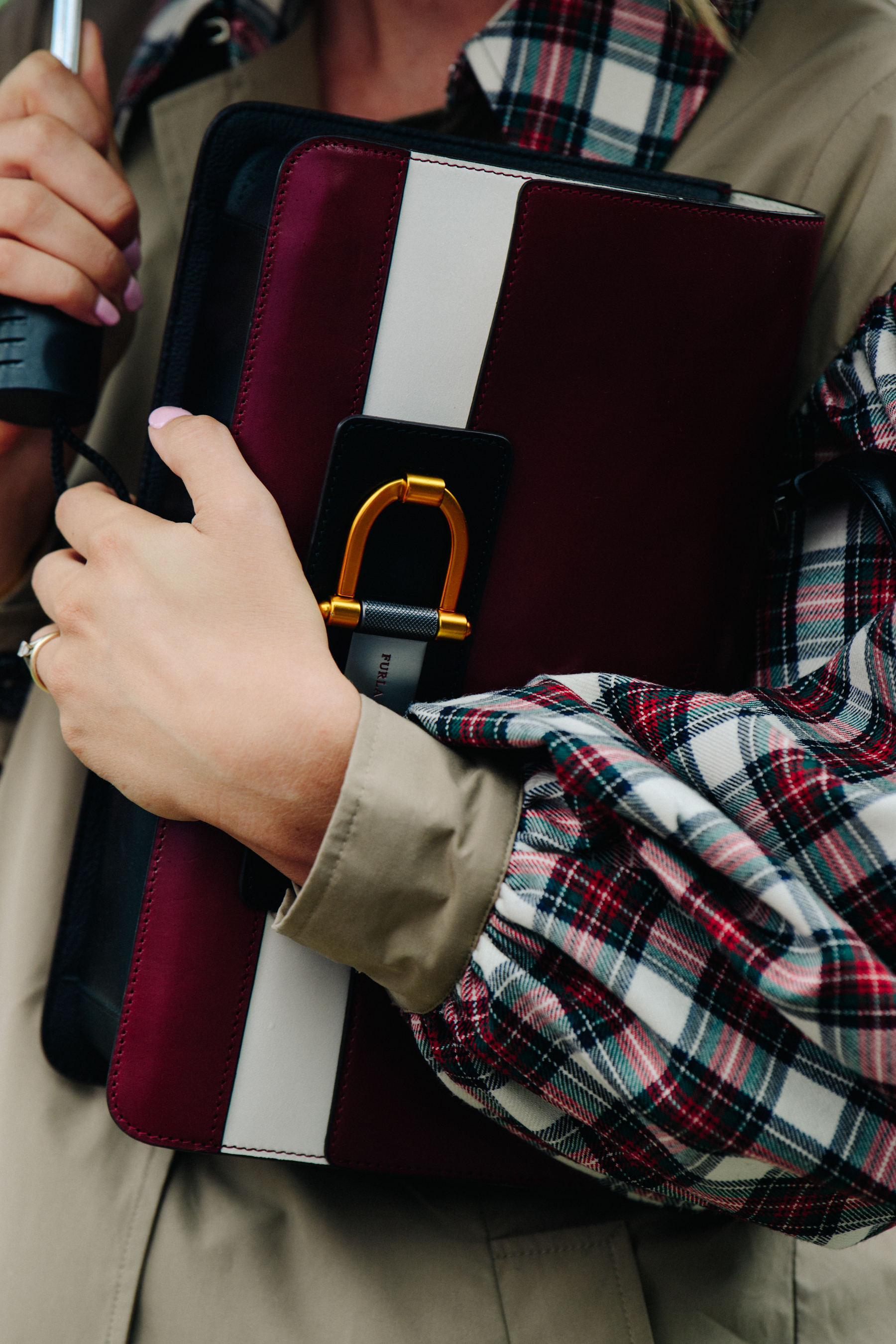 Woman carrying Furla purse