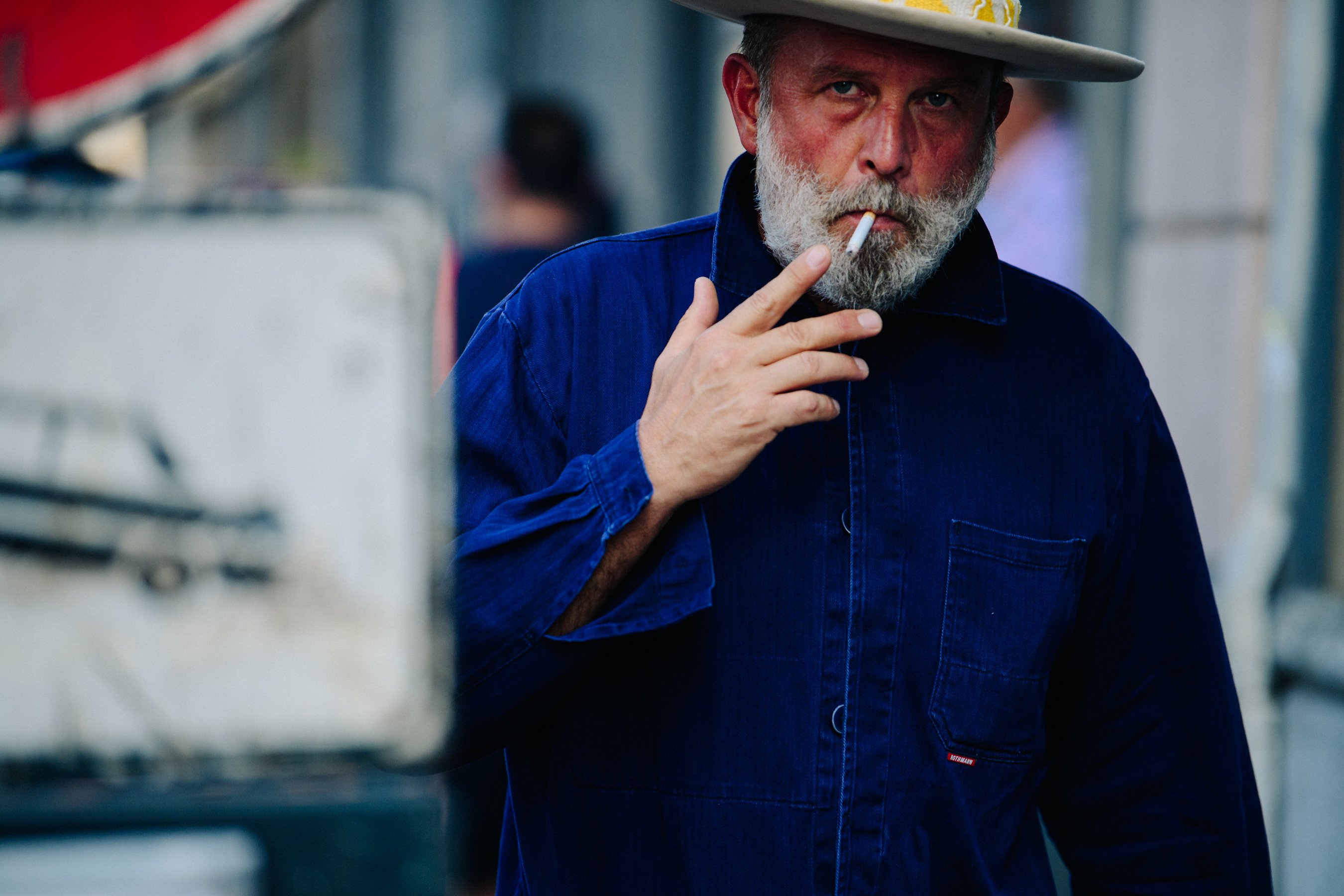Man wearing denim workers jacket