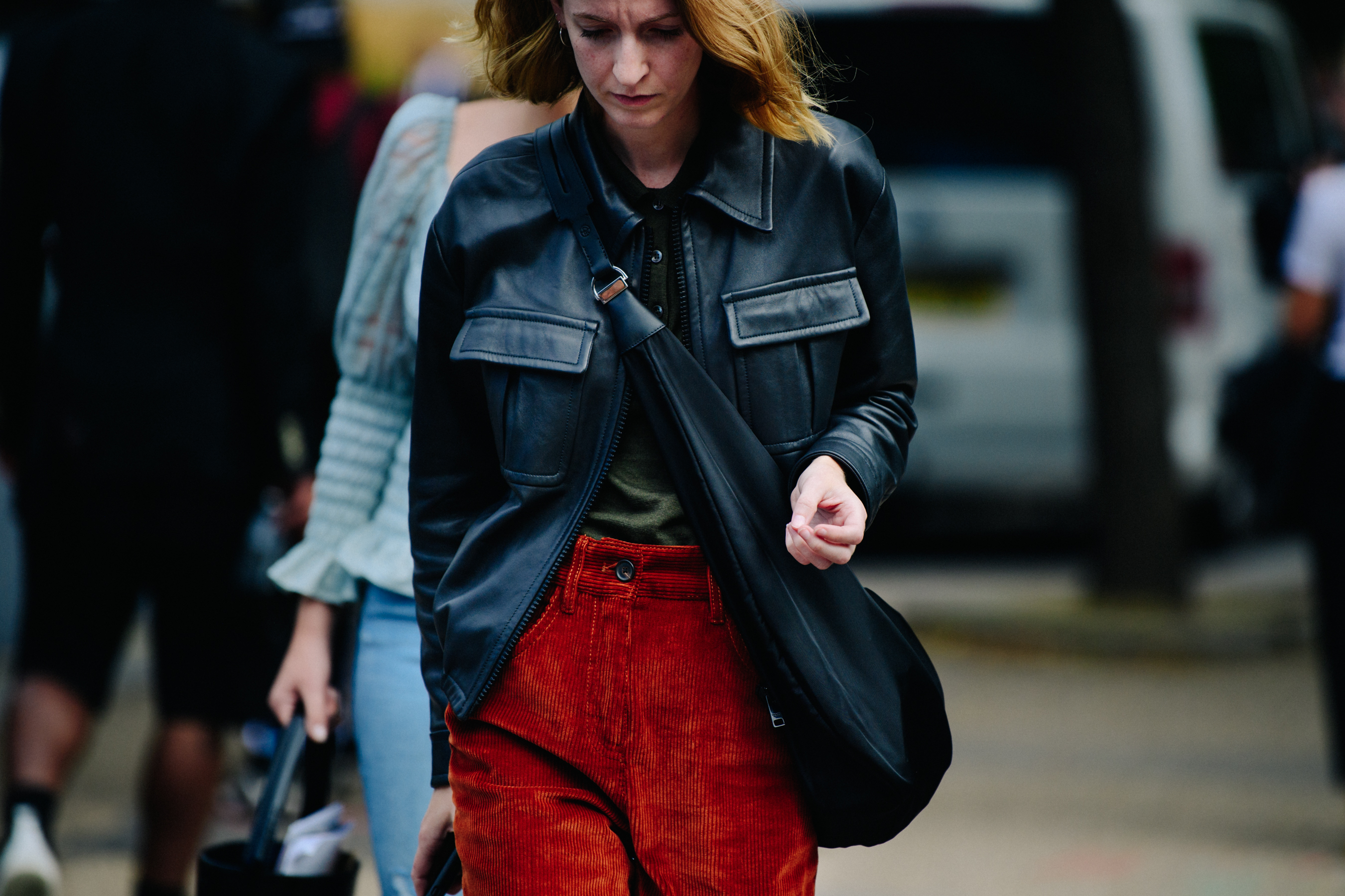 Woman wearing black leather jacket