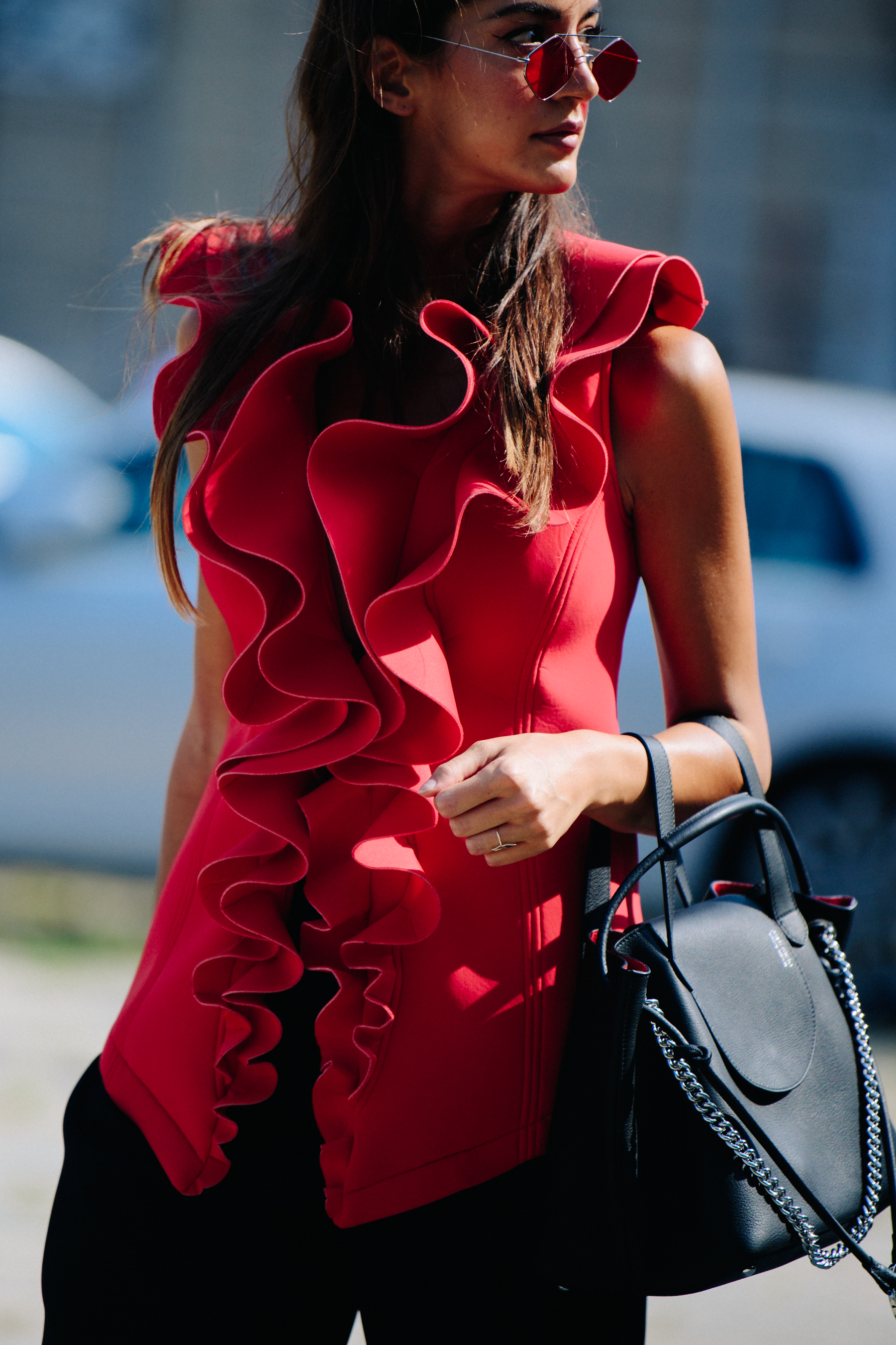 Woman wearing red top