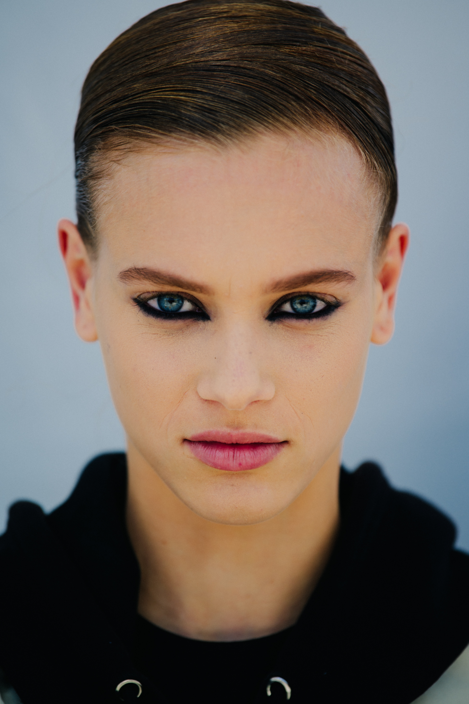 Portrait of model with black eye makeup