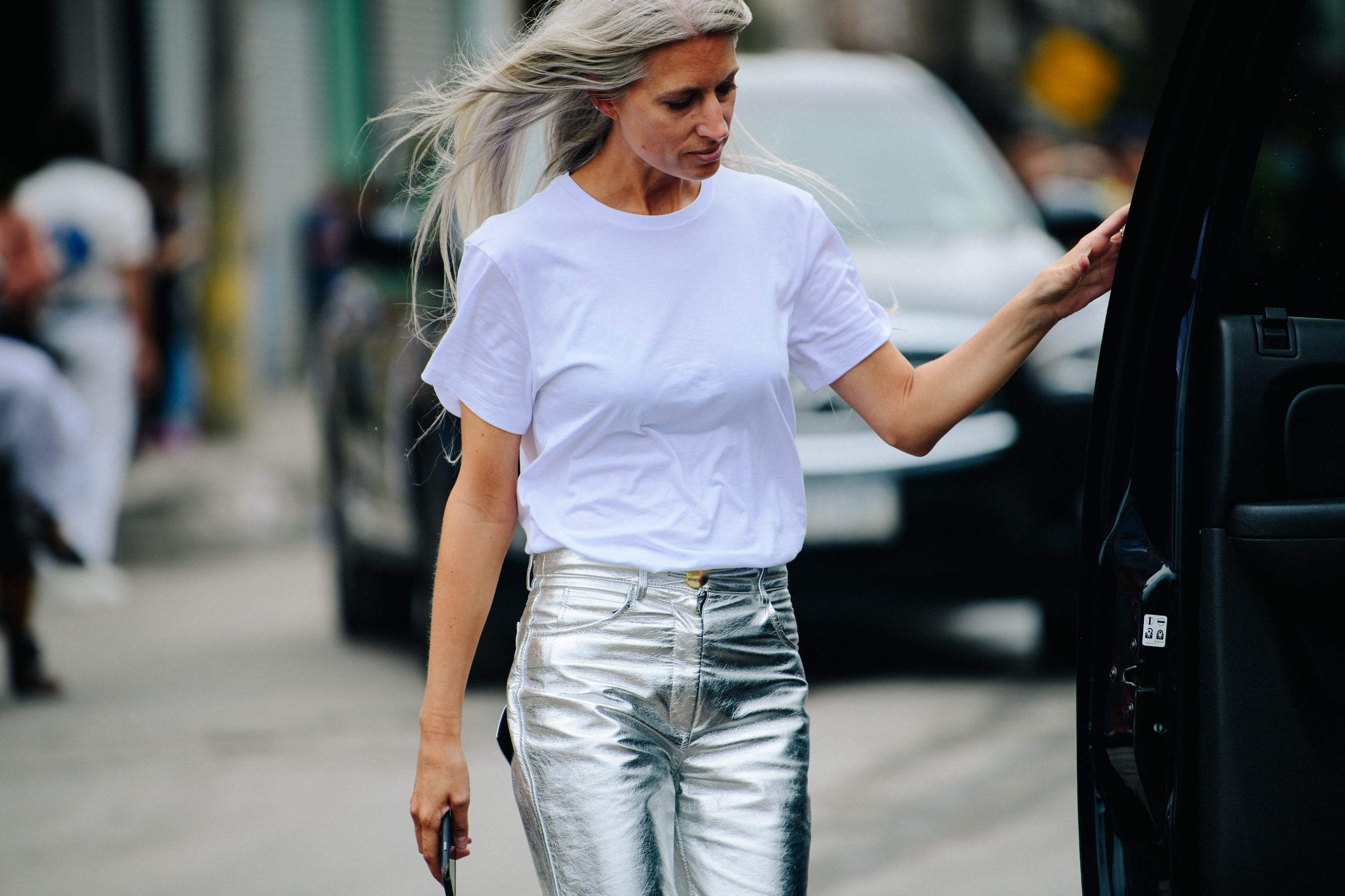 Woman wearing silver pants