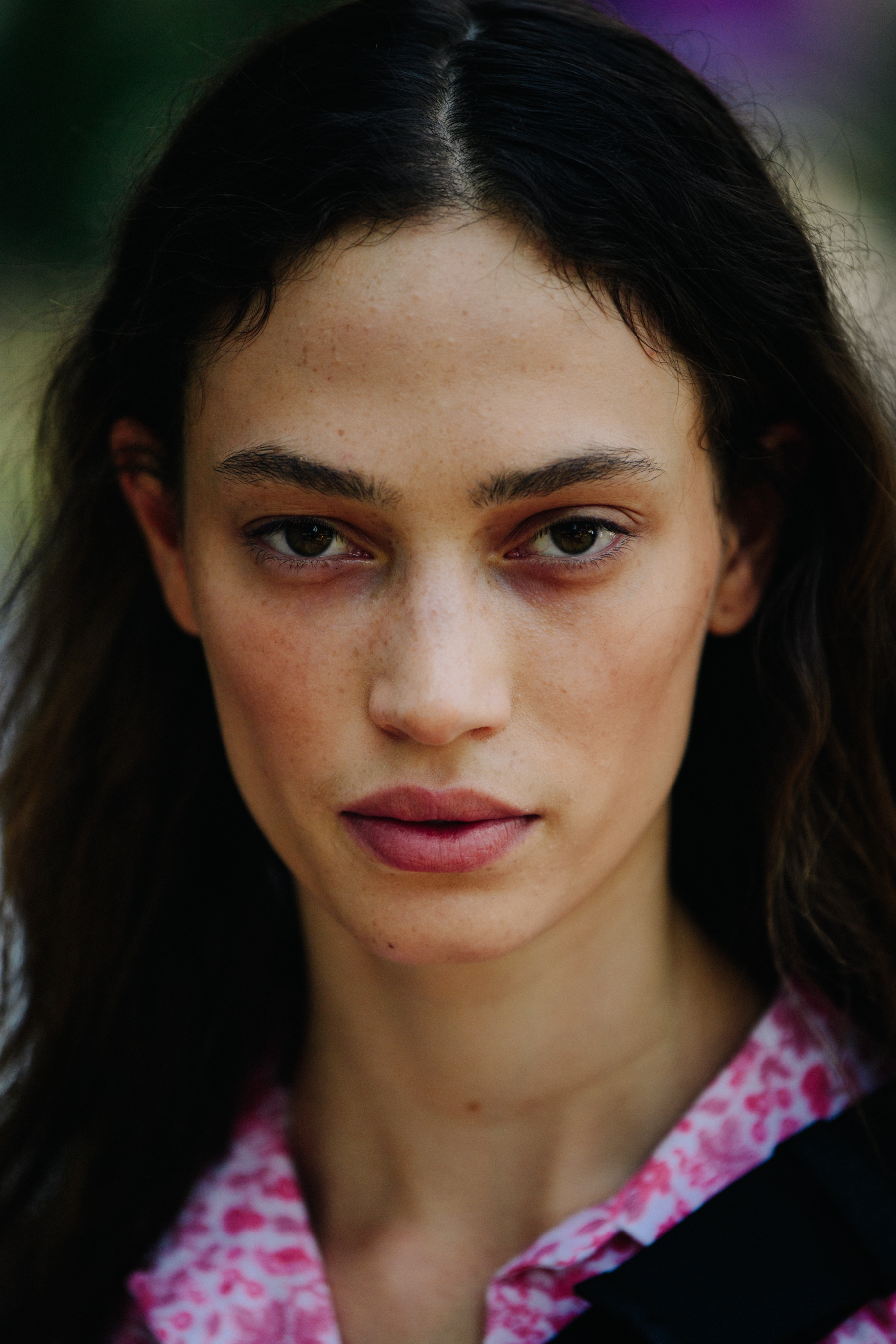 Portrait of model with long curly brown hair
