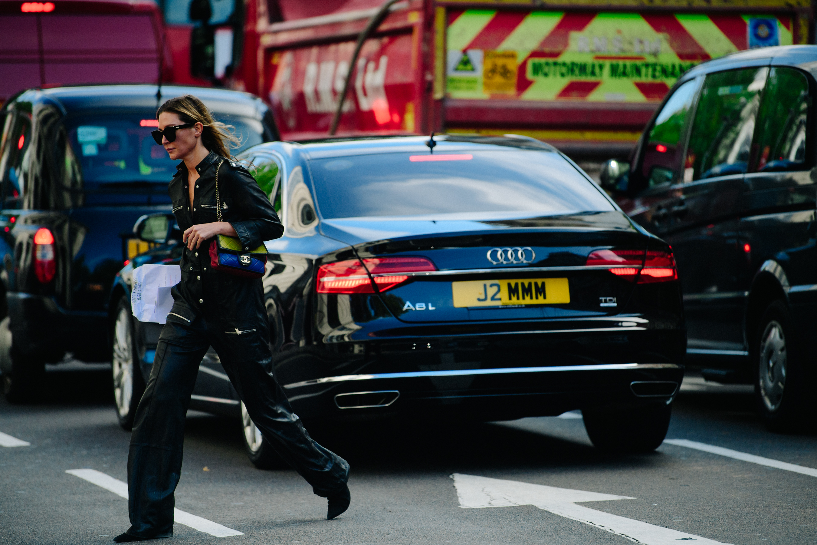 Woman wearing dark jumpsuit