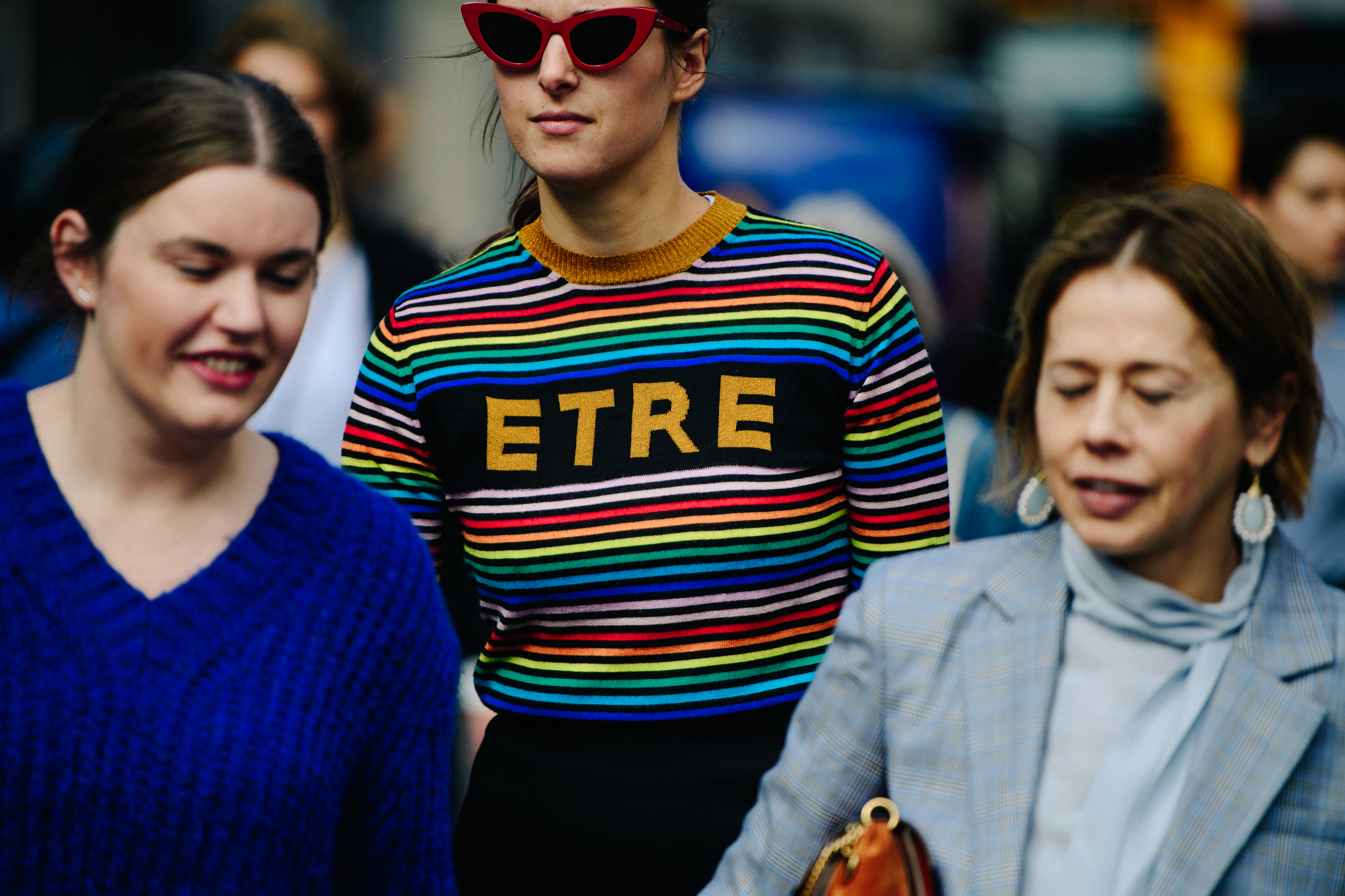 Woman wearing colourful striped top
