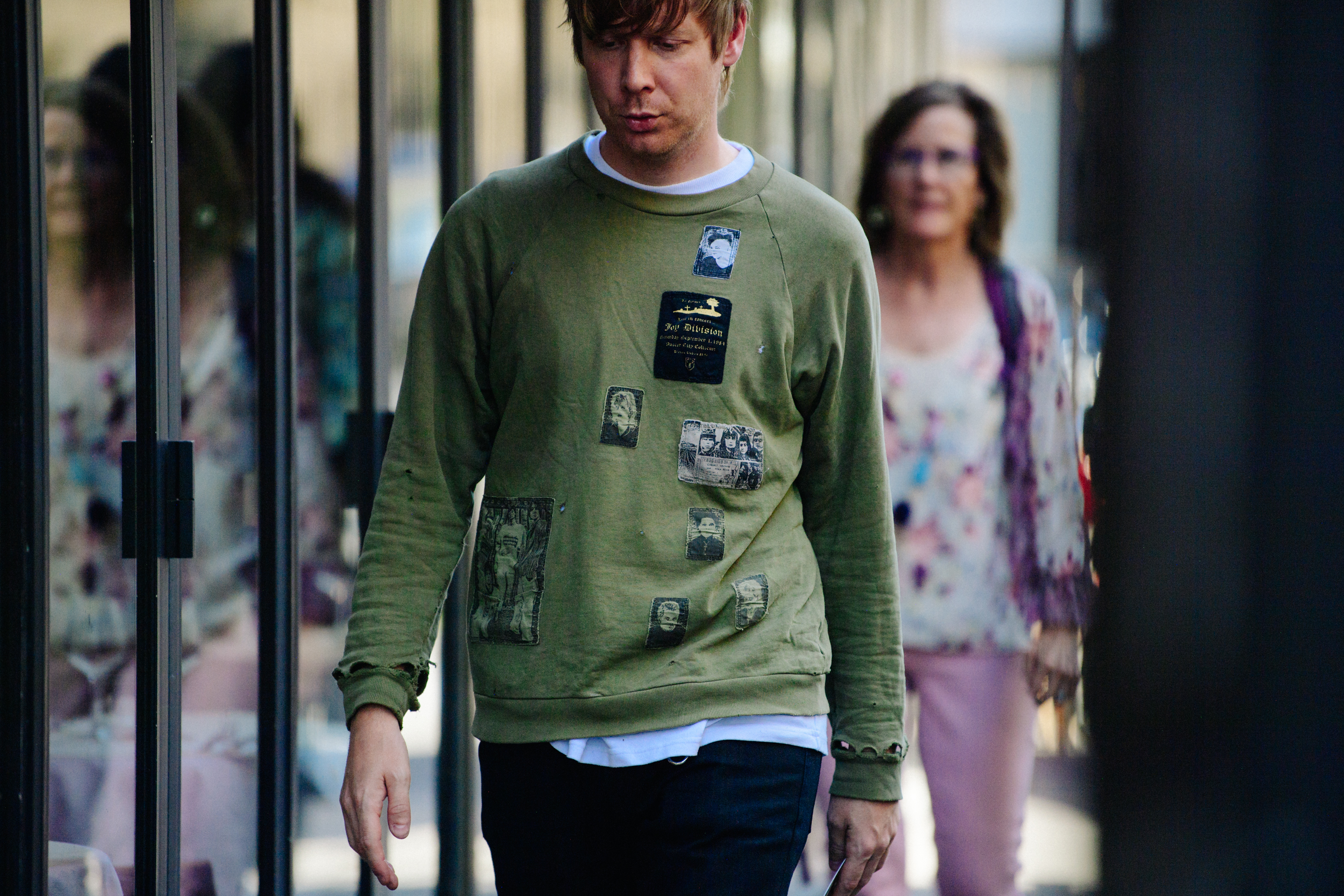 Man wearing green jumper
