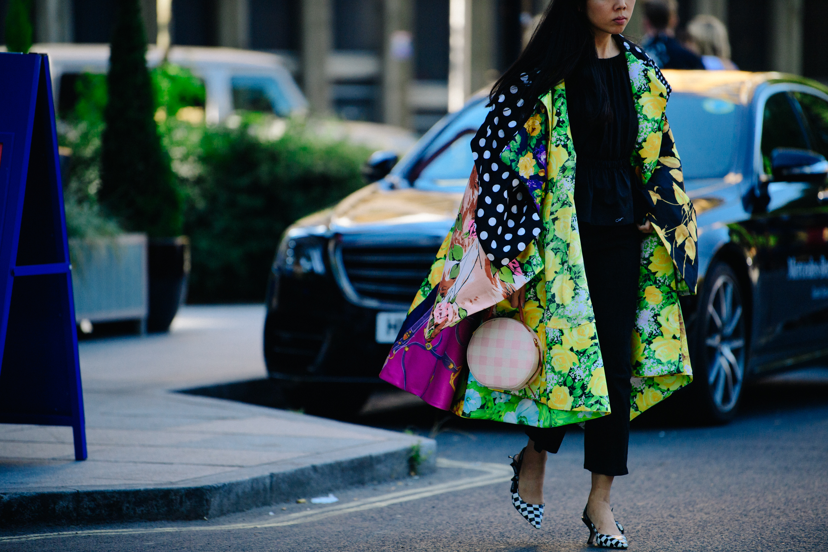 Asian blogger wearing floral coat