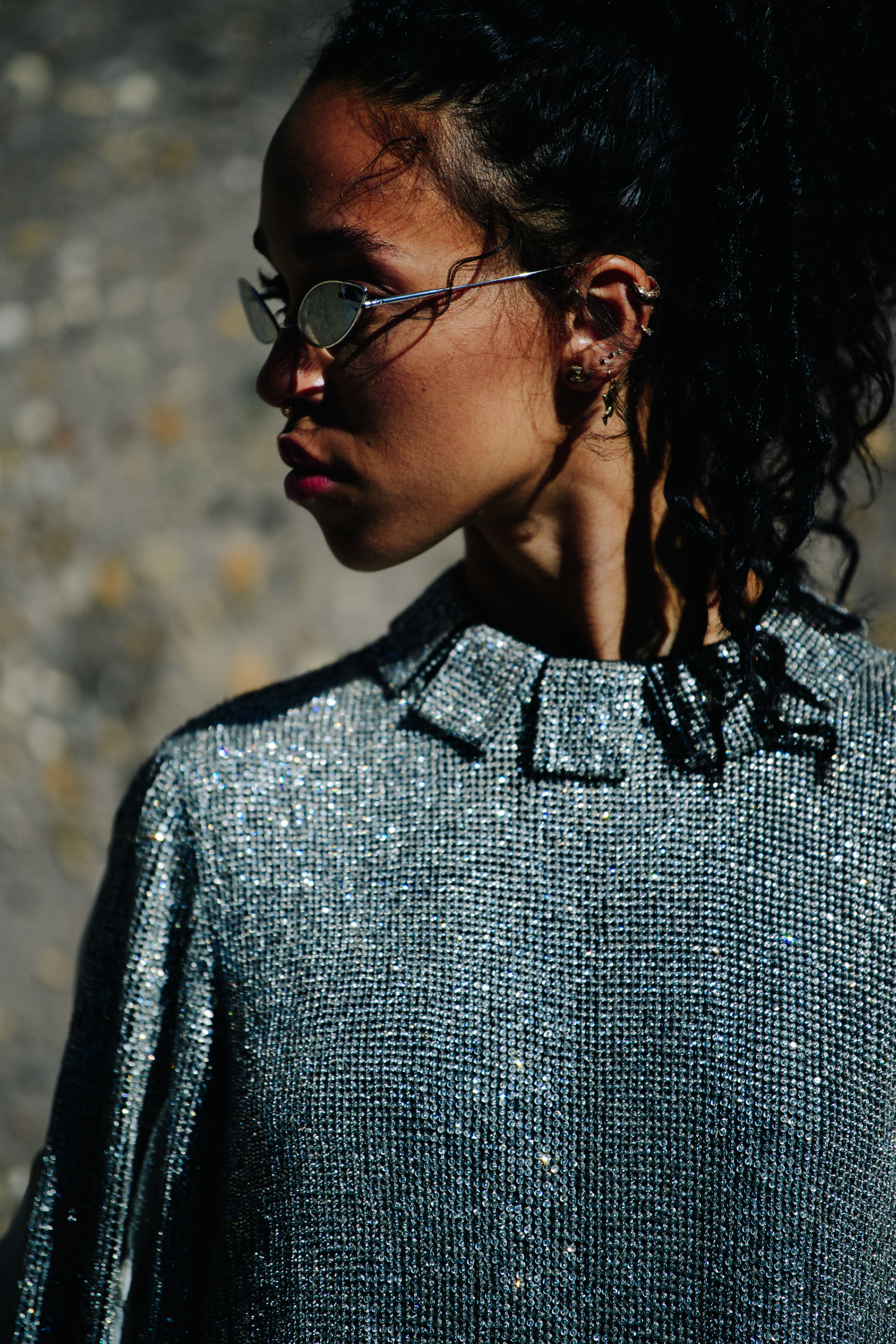Popstar wearing silver top