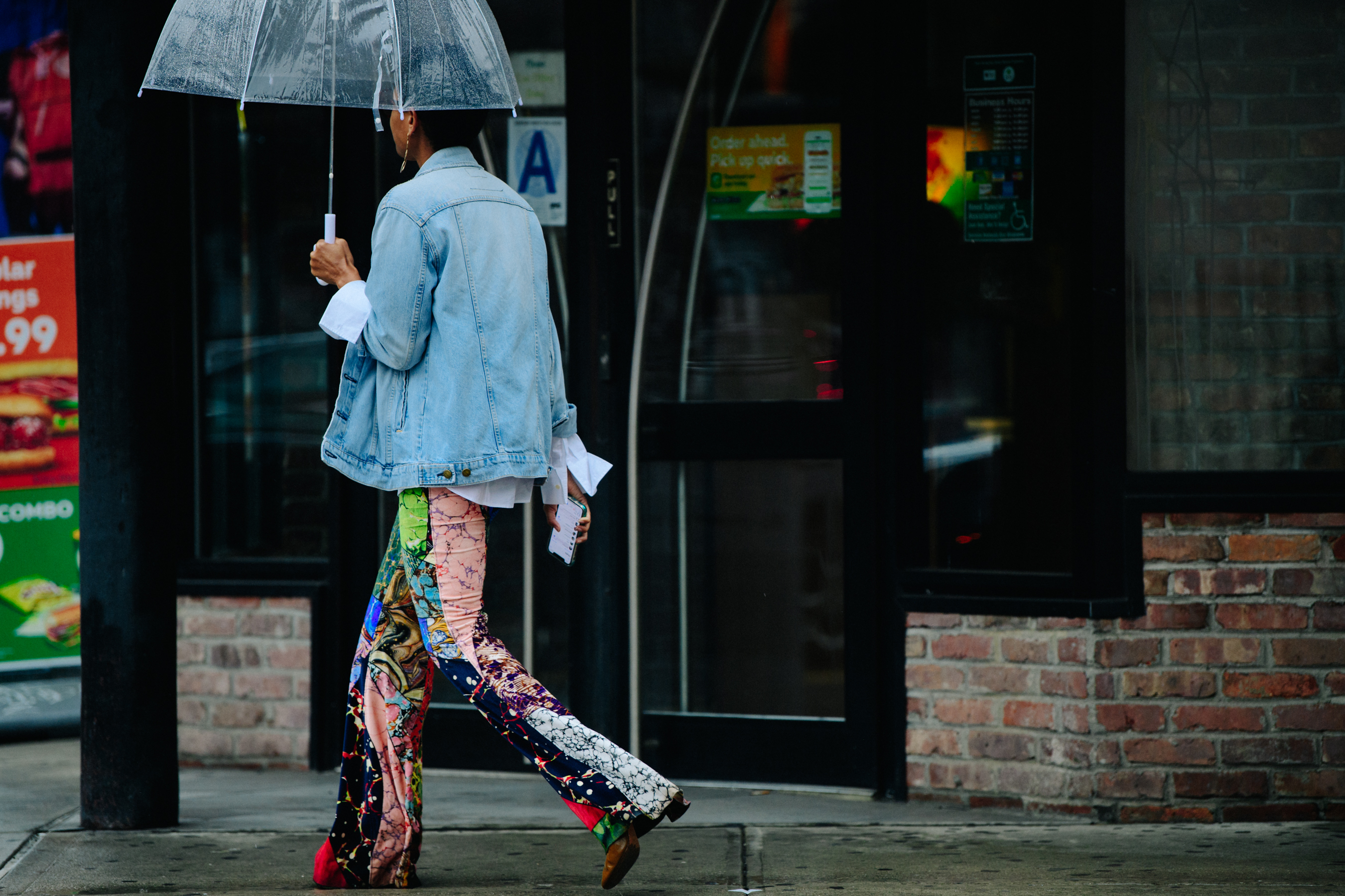 Woman wearing colourful pattern pants