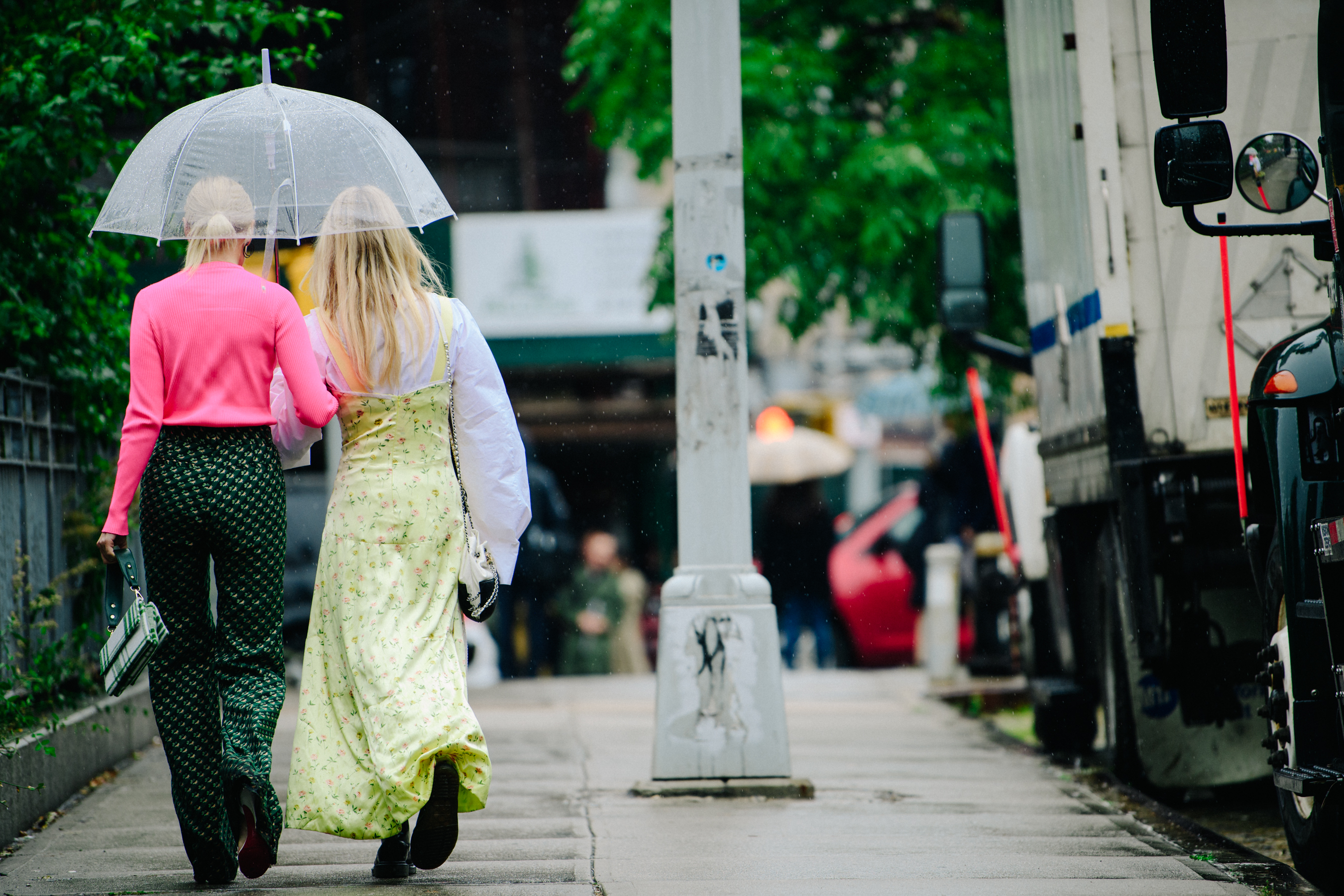 Two Danish women wearing pink and yellow