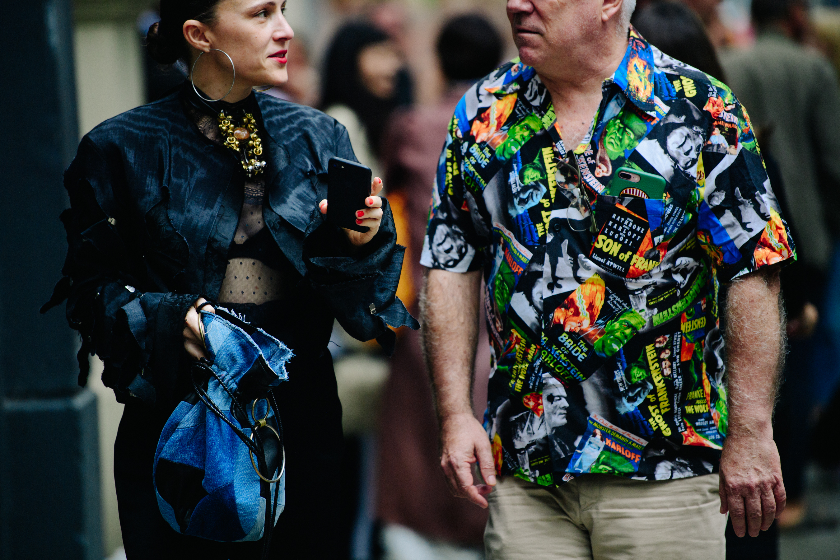 Couple wearing dark outfits