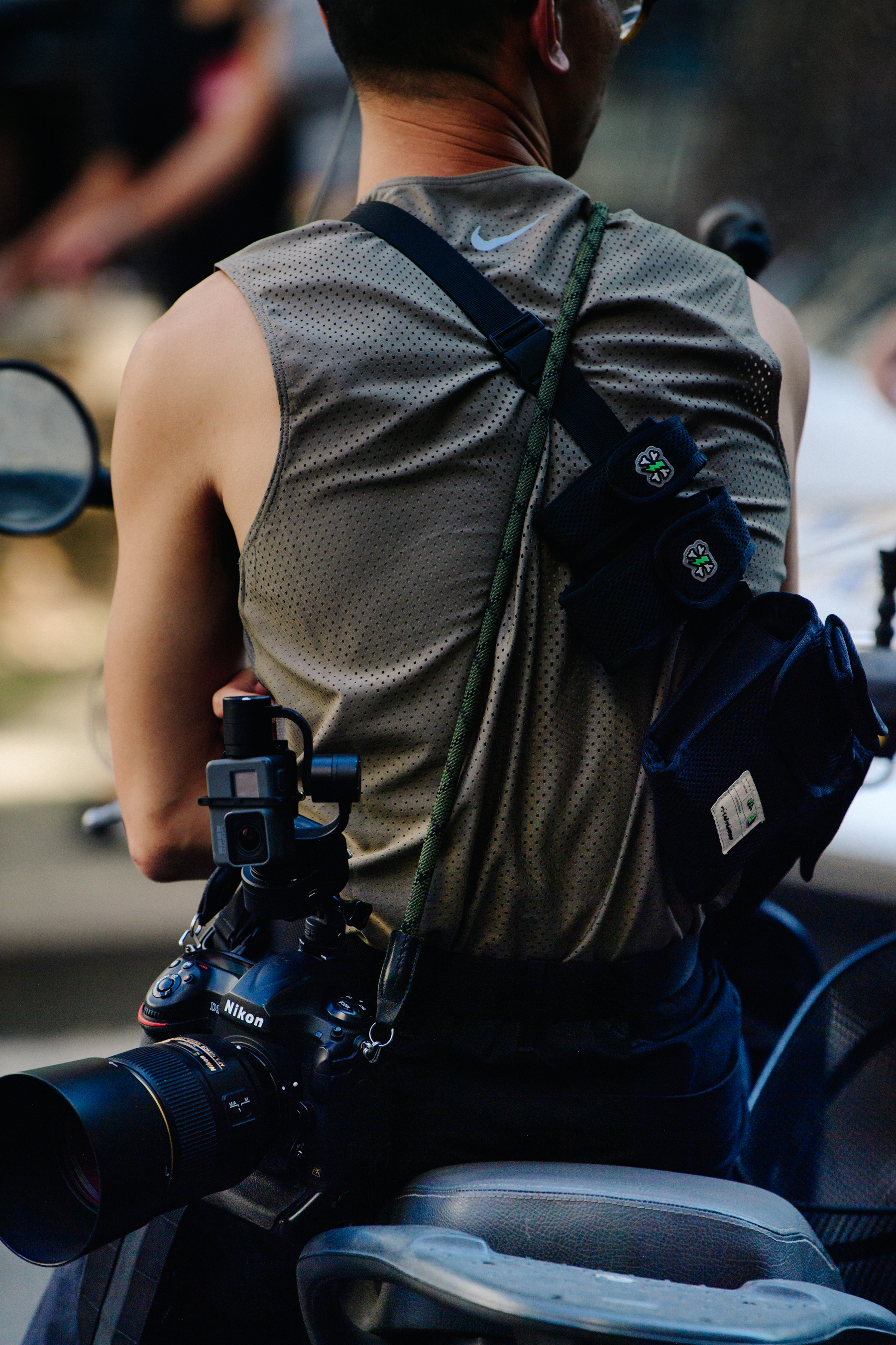 American photographer wearing Nike vest