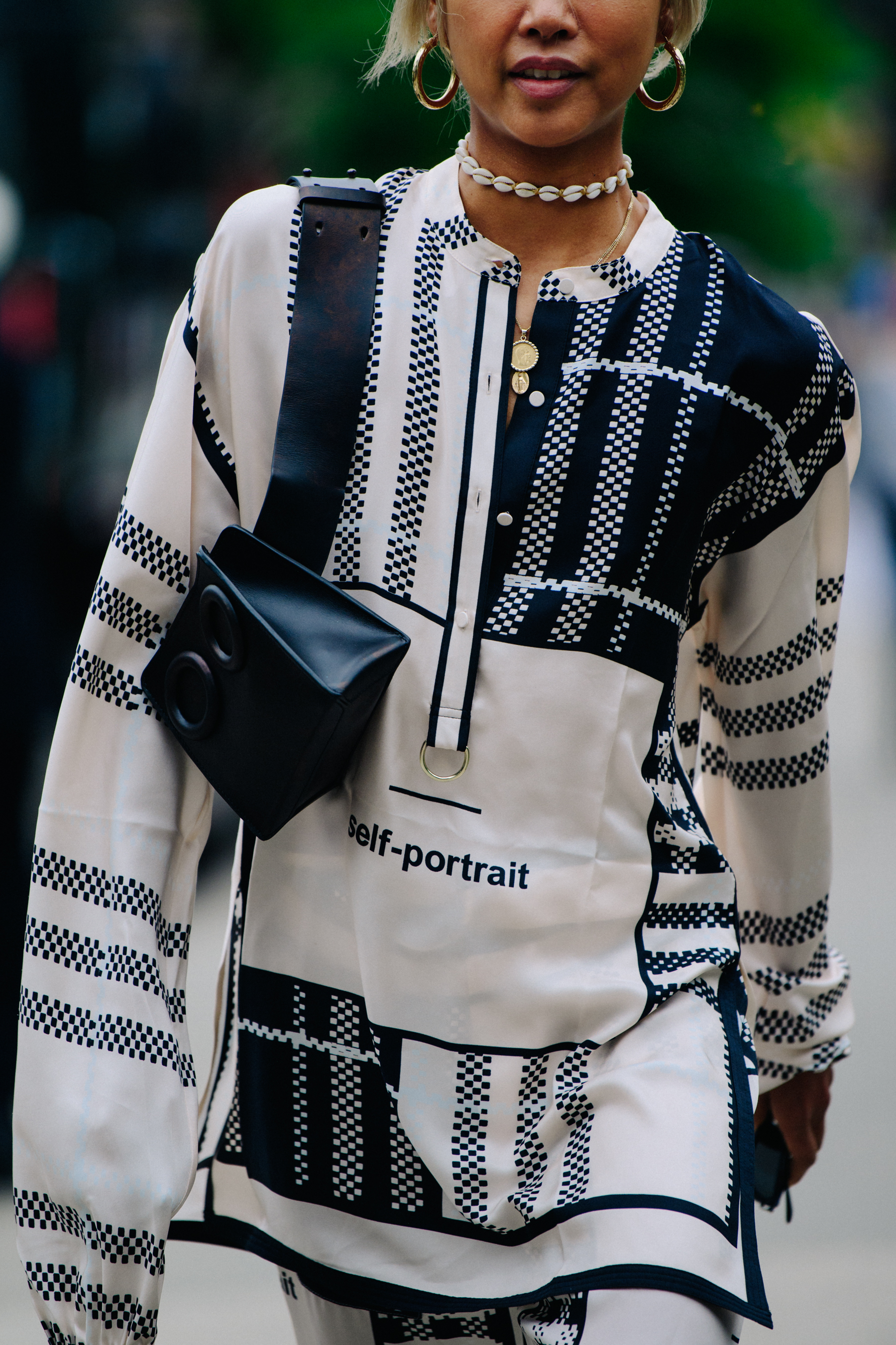 Asian blogger wearing pattern outfit