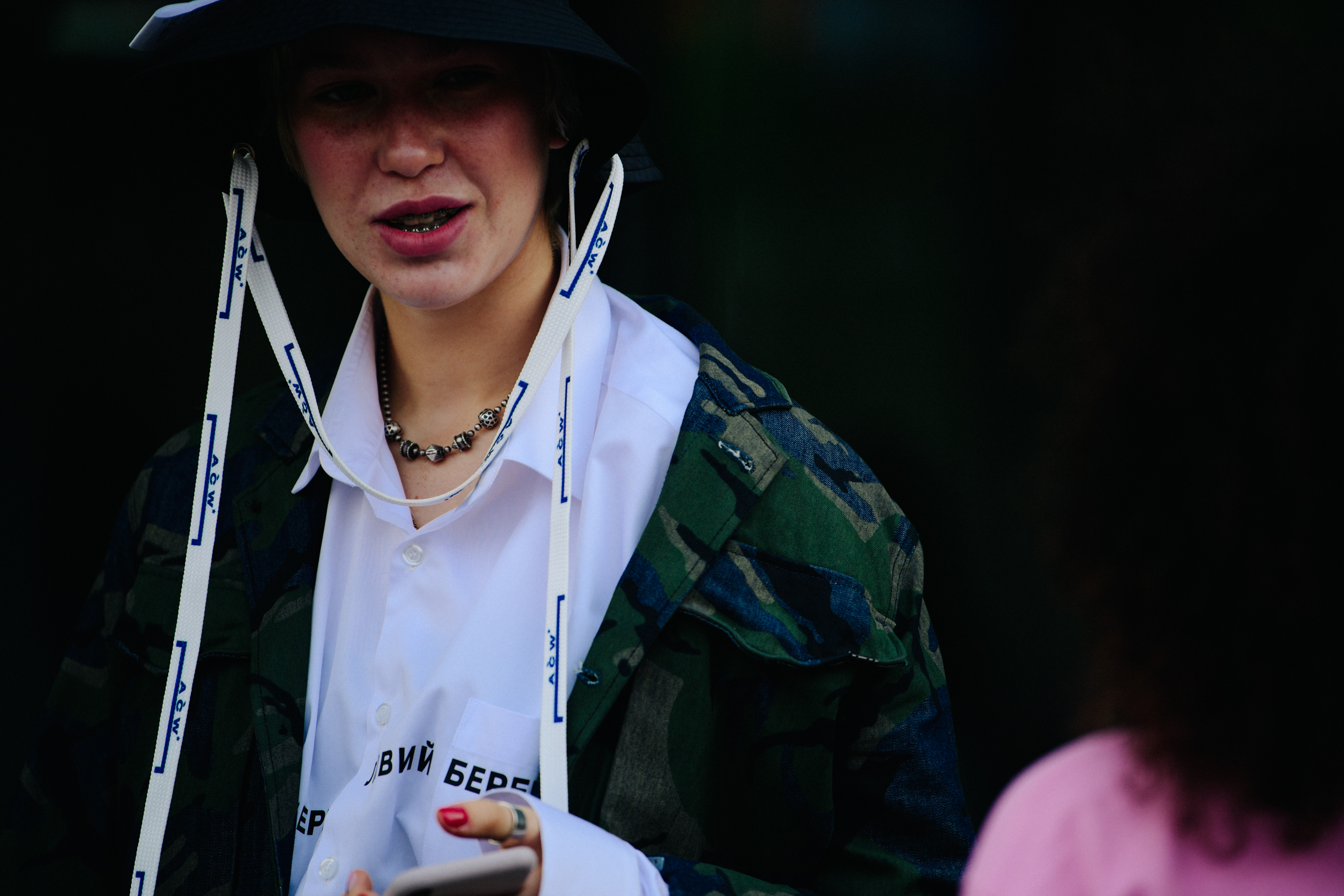 Woman wearing A Cold Wall hat