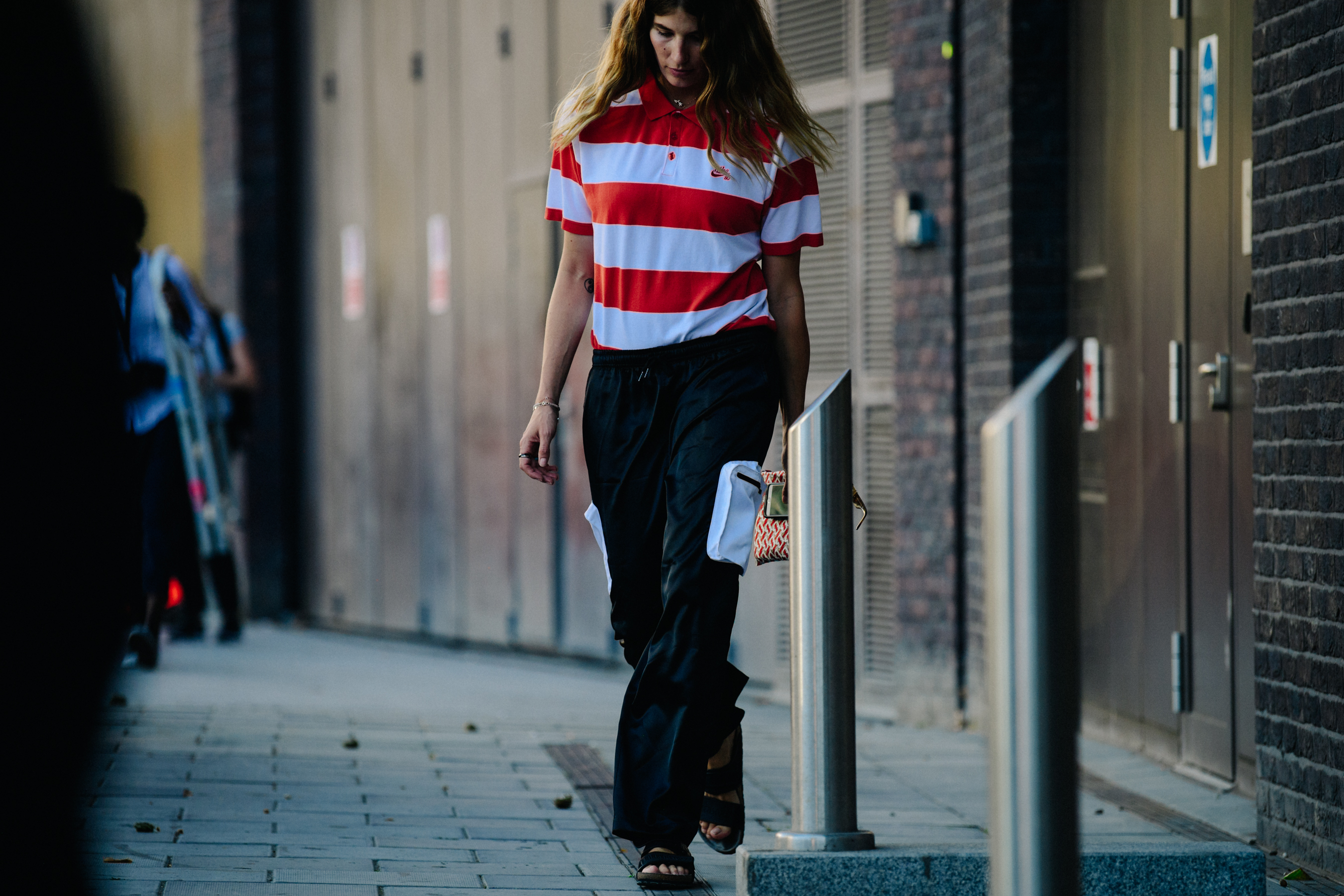 Stylist wearing striped top