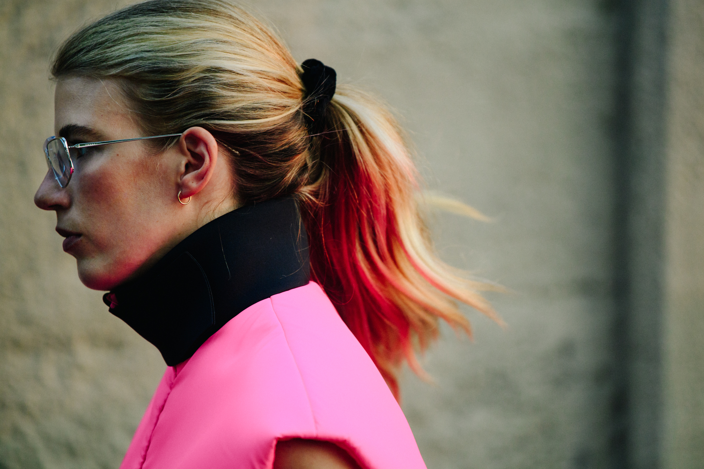 Woman wearing Prada glasses