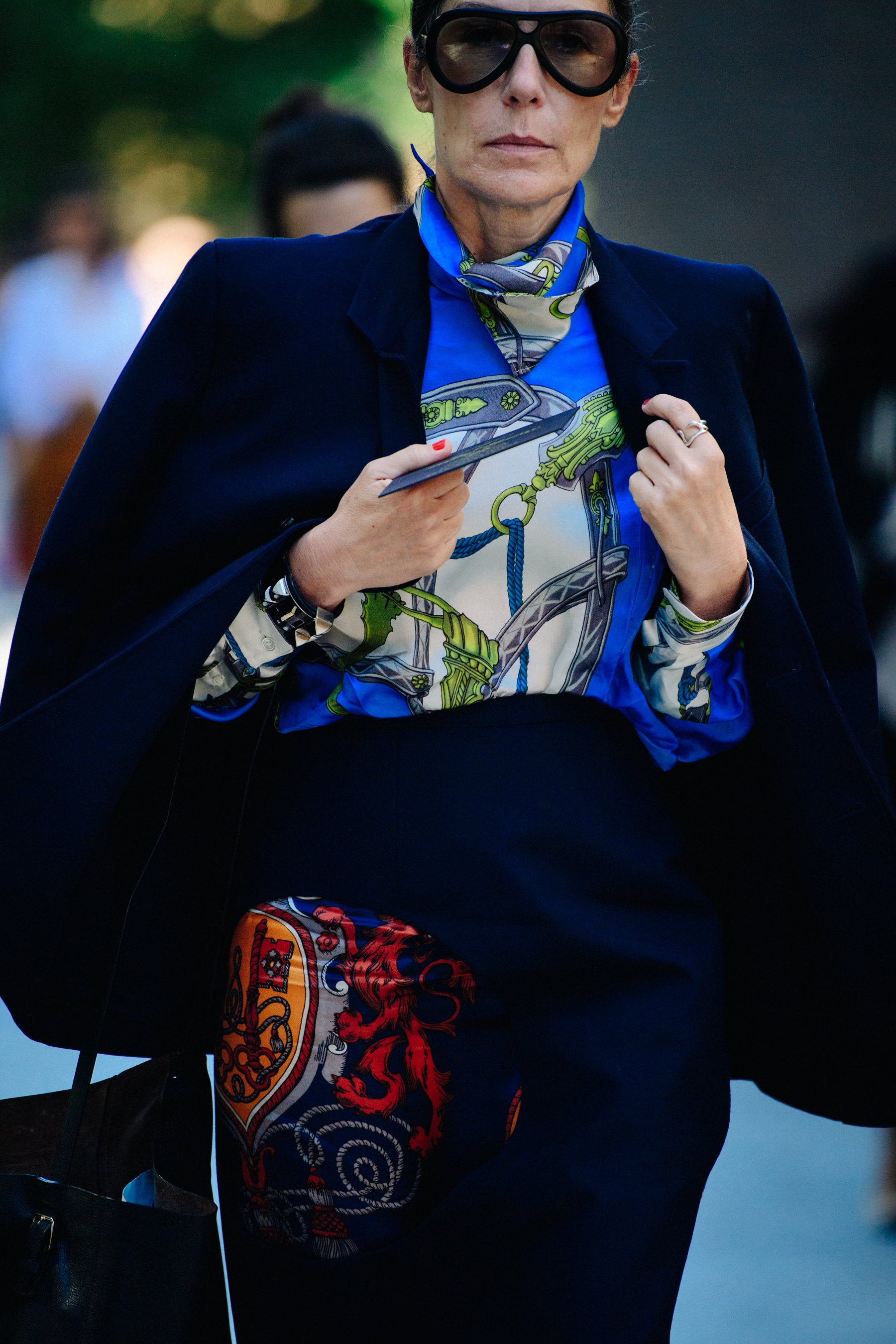 Woman wearing blue pattern top