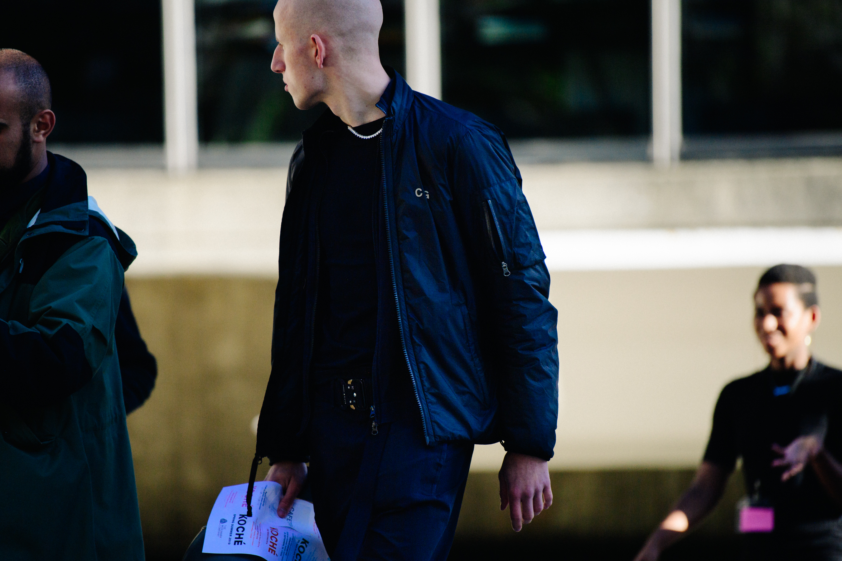 Man wearing black sports jacket