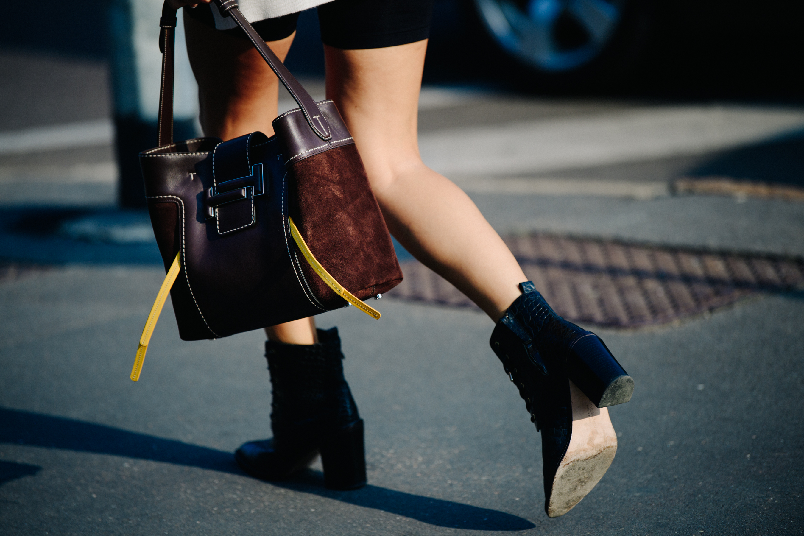 Woman wearing blue leather boots