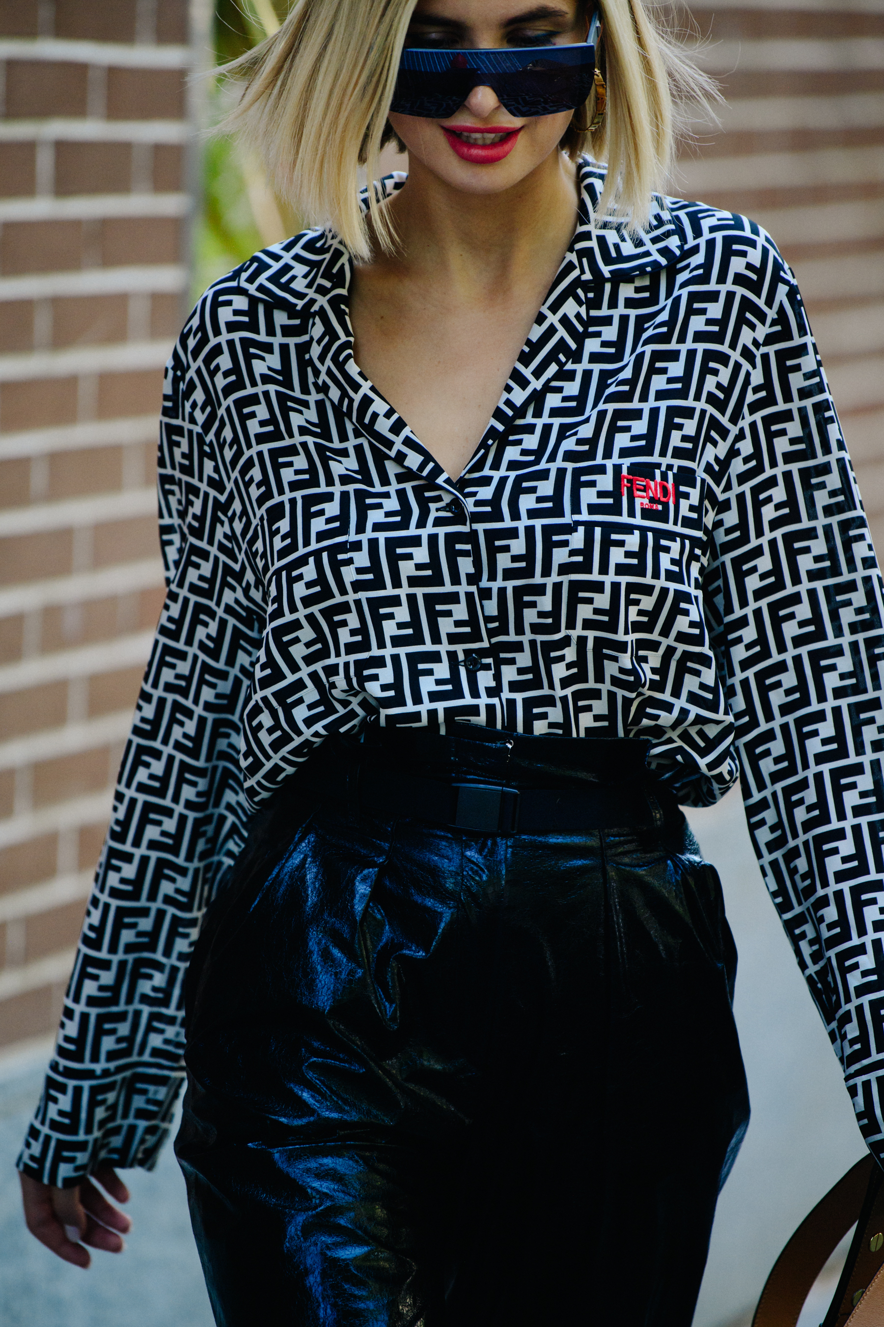 Woman wearing Fendi shirt